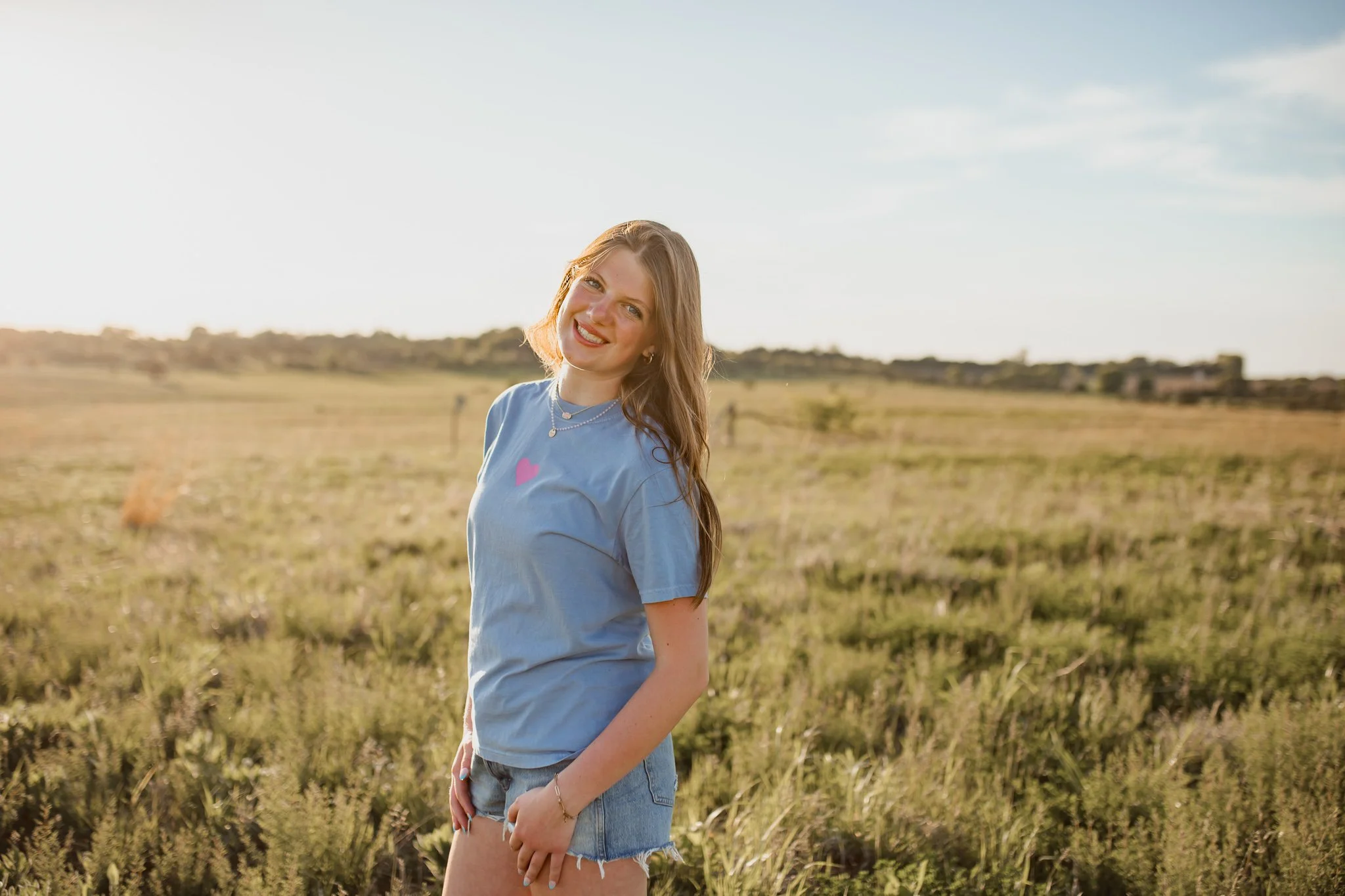 Christian comfort colors Above All else T-shirt inspired by bible verse proverbs 4:23.  blue denim tee with pink and white screen print reminding believers to guard your heart