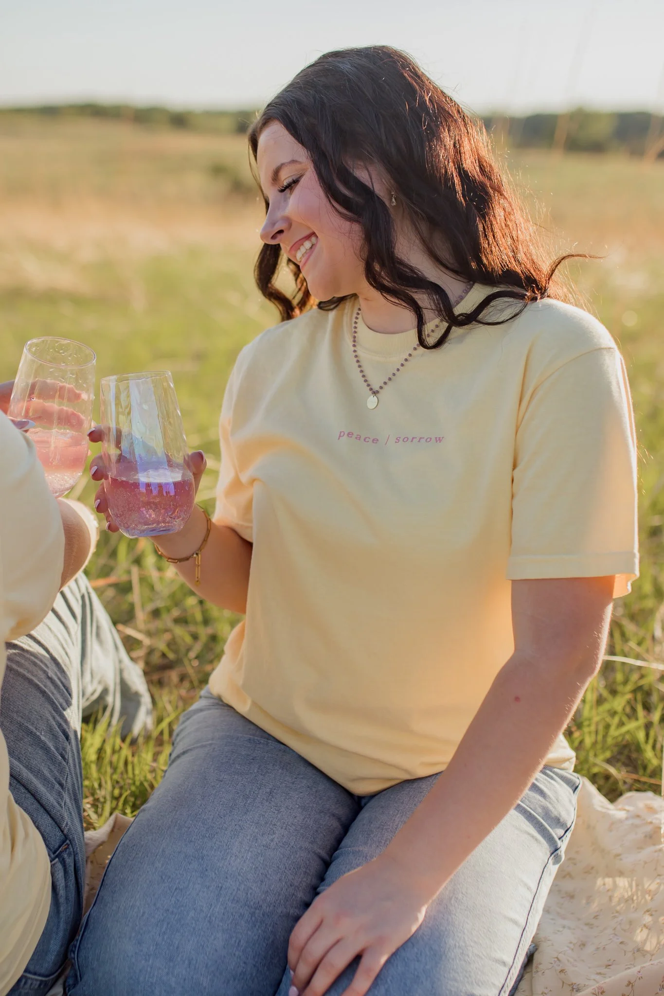 Christian comfort colors Take Heart I have Overcome T-shirt inspired by John 16:33.  Butter yellow tee with pink screen print reminding believers Christ as overcome.