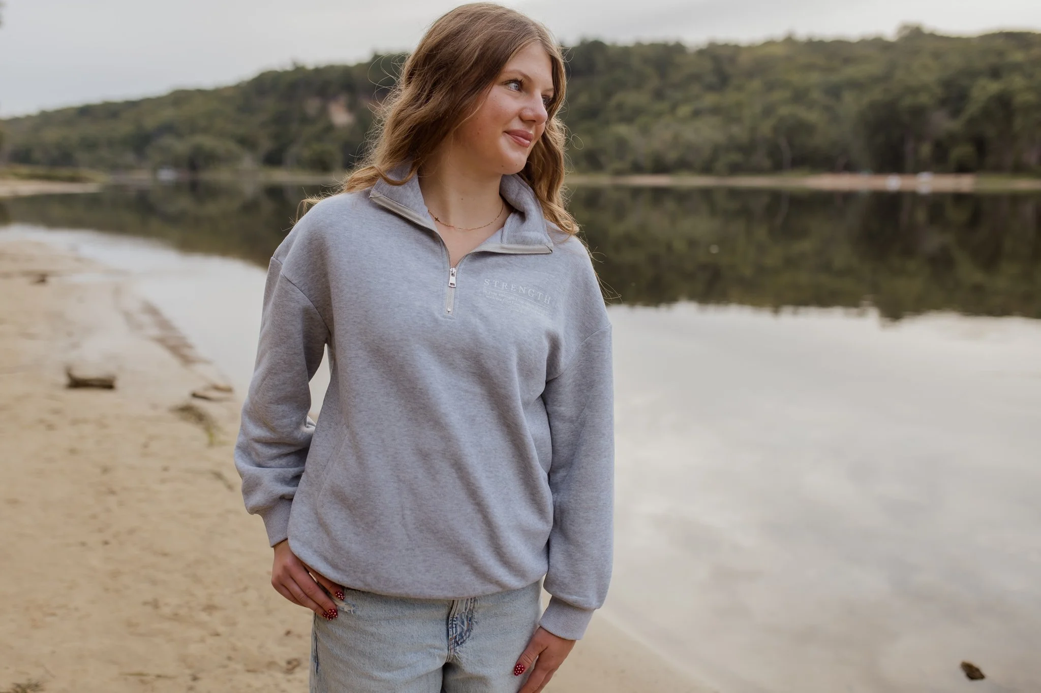 christian quarter-zip with bible verse psalm 18:29 strength