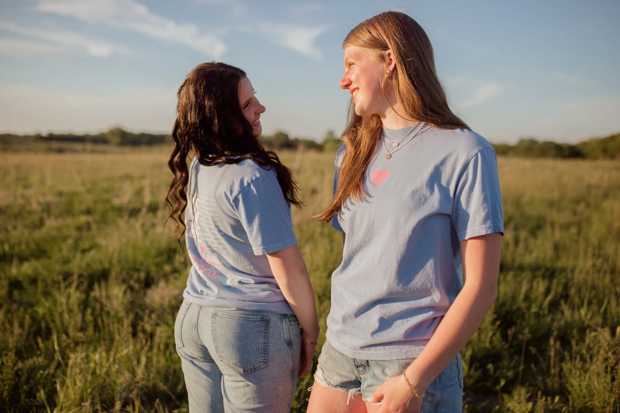 Christian comfort colors Above All else T-shirt inspired by bible verse proverbs 4:23.  blue denim tee with pink and white screen print reminding believers to guard your heart