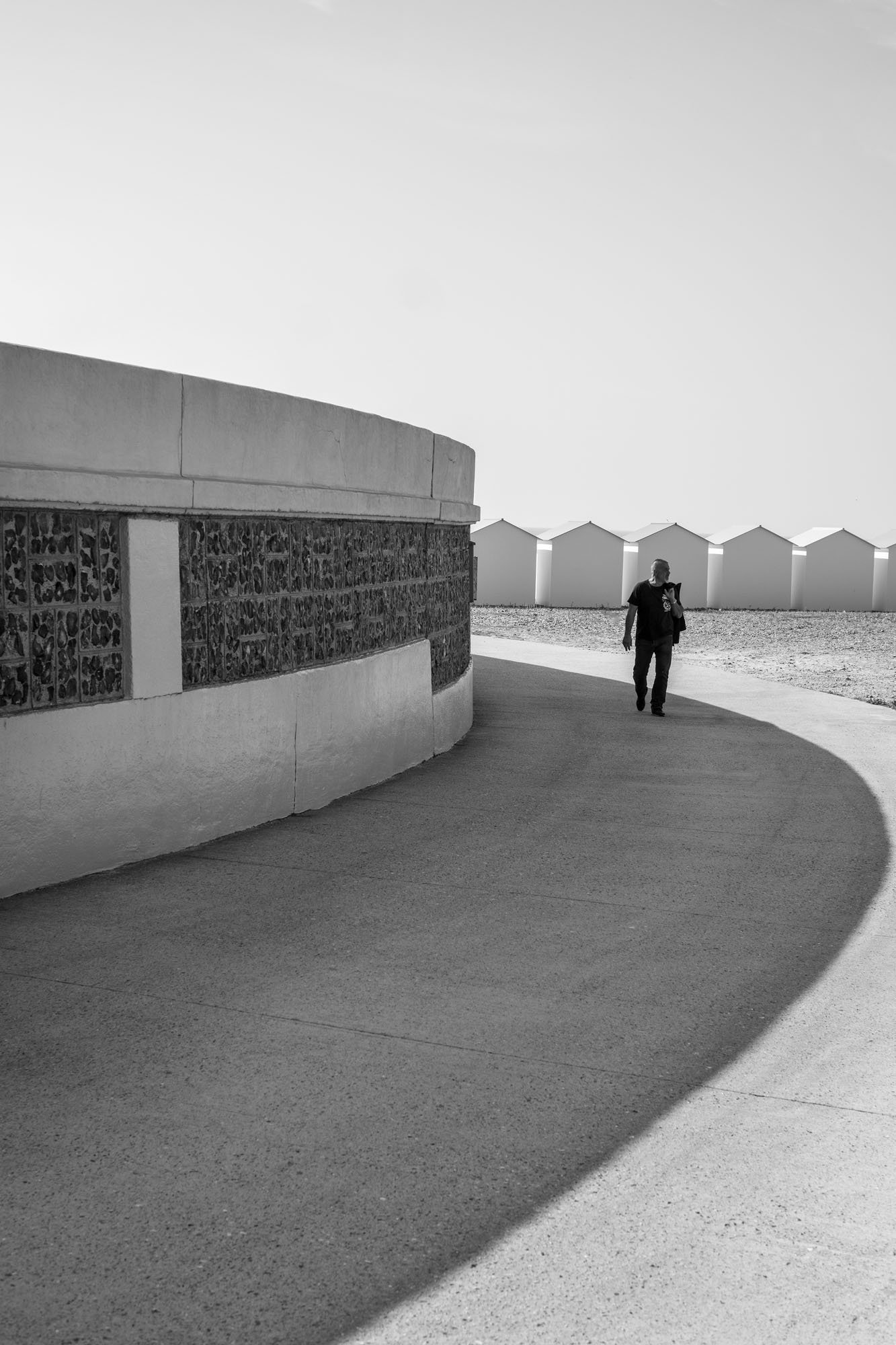  Black-and-white seaside photograph on the beach at Le Tréport, Normandy, by Chris Perona. 