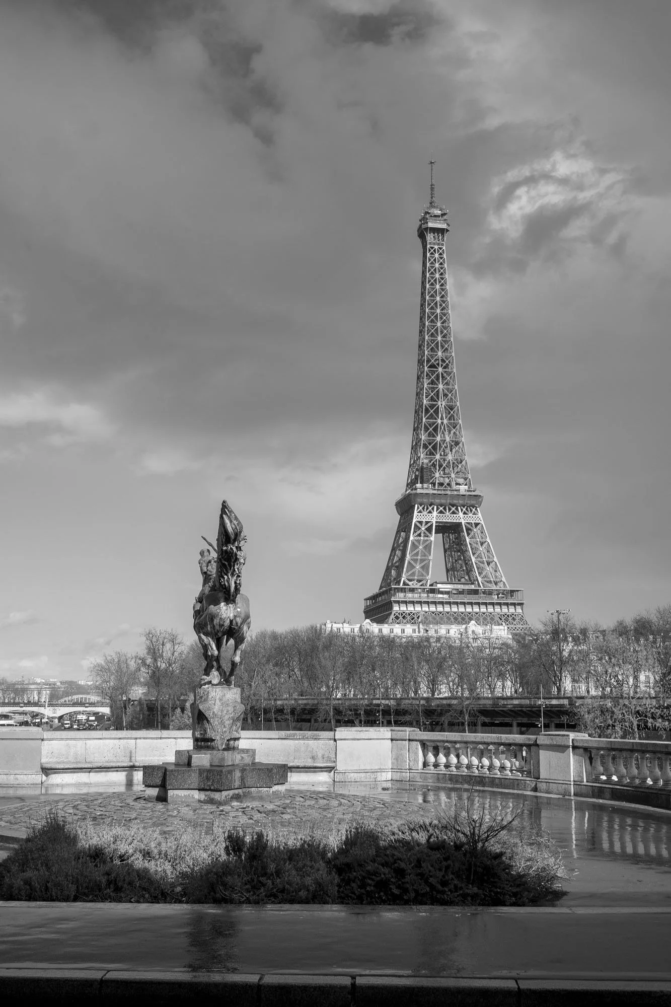  The equestrian statue and the Eiffel Tower under a dramatic sky, Pont de Bir-Hakeim, Paris. Photograph by Chris Perona. 