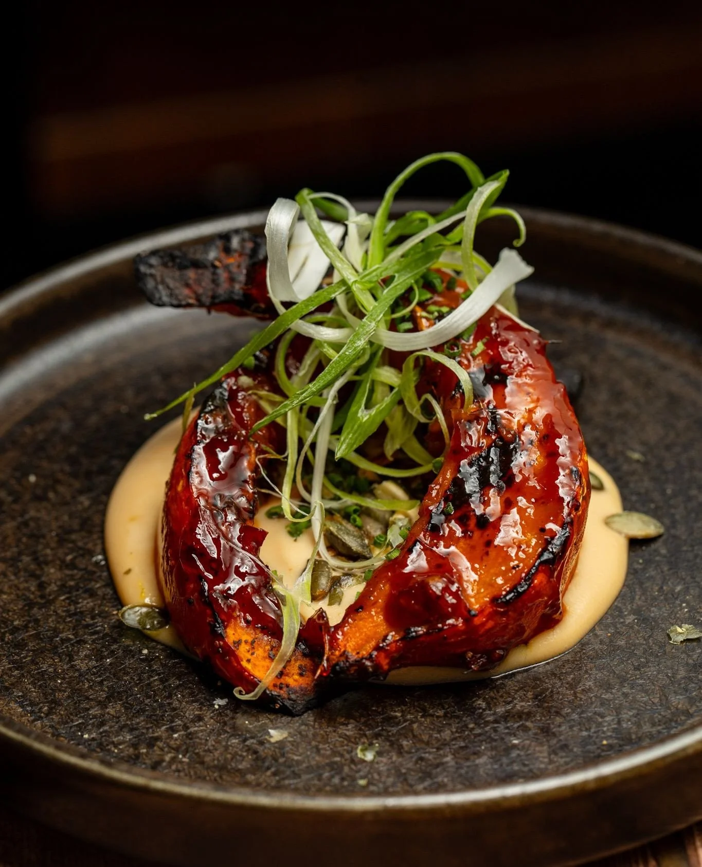 Some soul-warming highlights from @bonsaiplantkitchen&rsquo;s OctoberBEST menu. BBQ pumpkin with soy + ginger glaze, crispy &ldquo;pork&rdquo; won ton, and a Vietnamese coffee cr&egrave;me caramel to finish 🍮⁠
⁠
Only available 11th-26th October so g