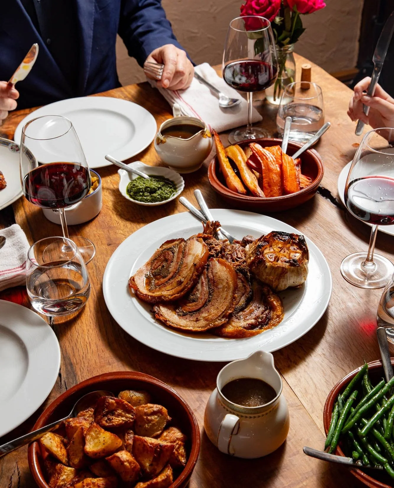 Sunday roast at @poco.wine 🤎⁠
⁠
Home-rolled porchetta, slow-cooked lamb shoulder and all the veg you can manage.⁠
⁠
The perfect way to settle in after a winter walk over the Downs into Alfriston.