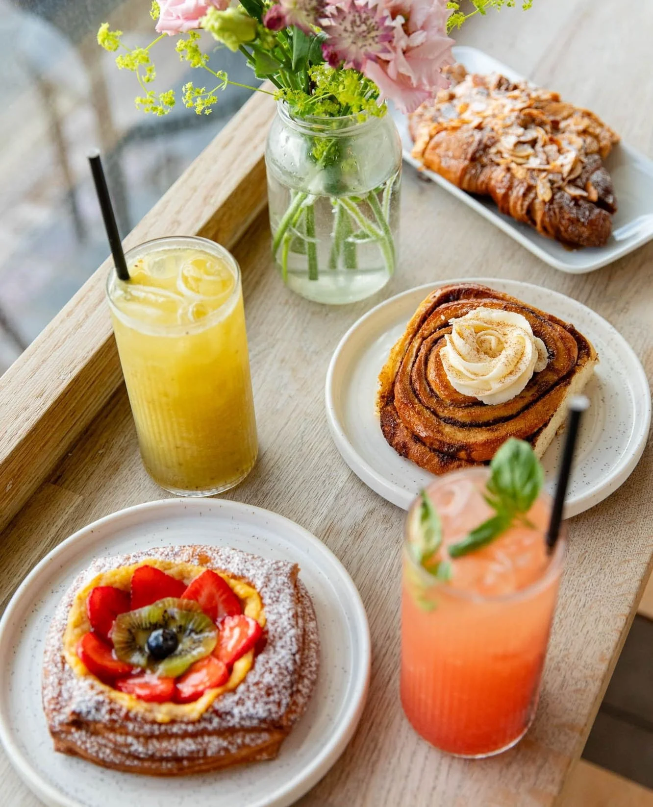Always lovely to stop by @bayon.bakery in Hove to capture their indulgent pastries and vibrant drinks - summer menu in full swing! 🌈🥐