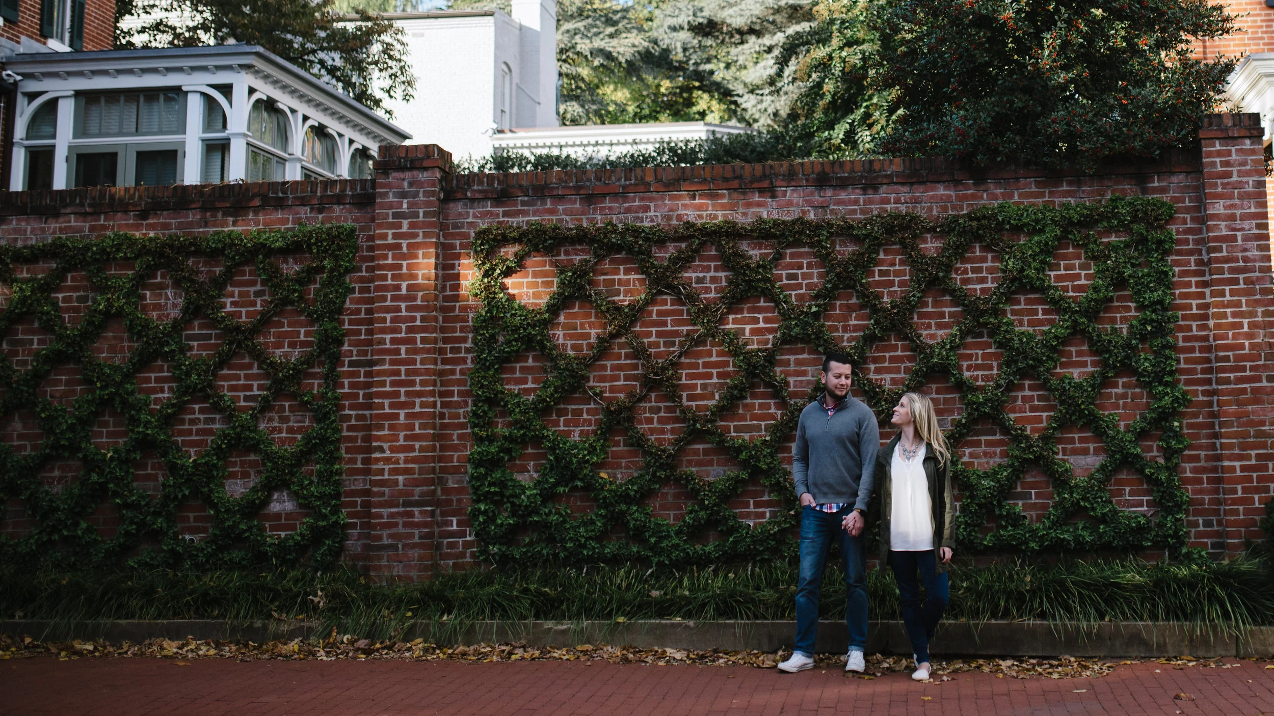 georgetown engagement session along the brick sidewalk
