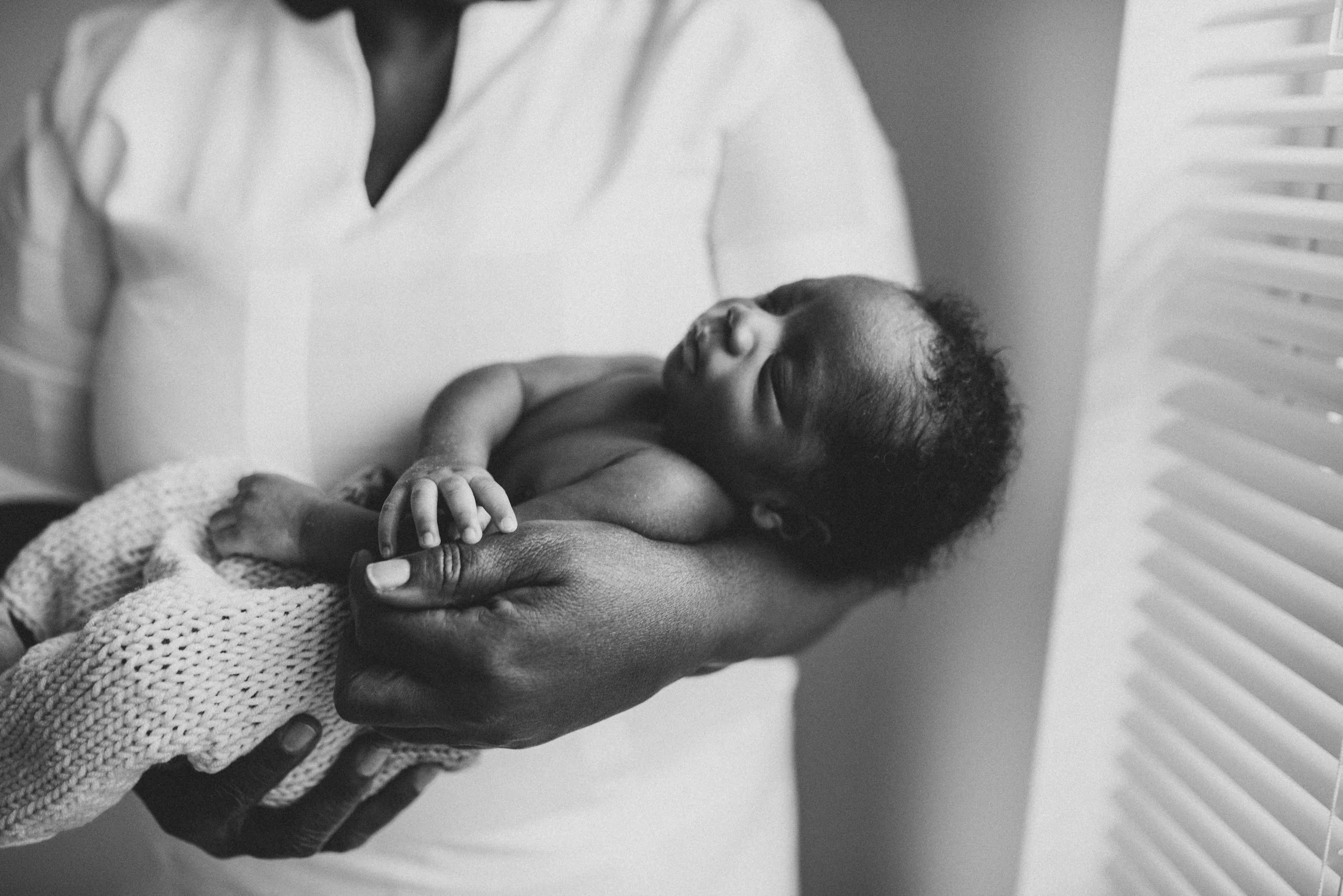 A couple months after her maternity portraits I met up with Fiona again and helped welcome little Omar into the world. Just look at that head full of curls. I know that Fiona is absolutely in love. 