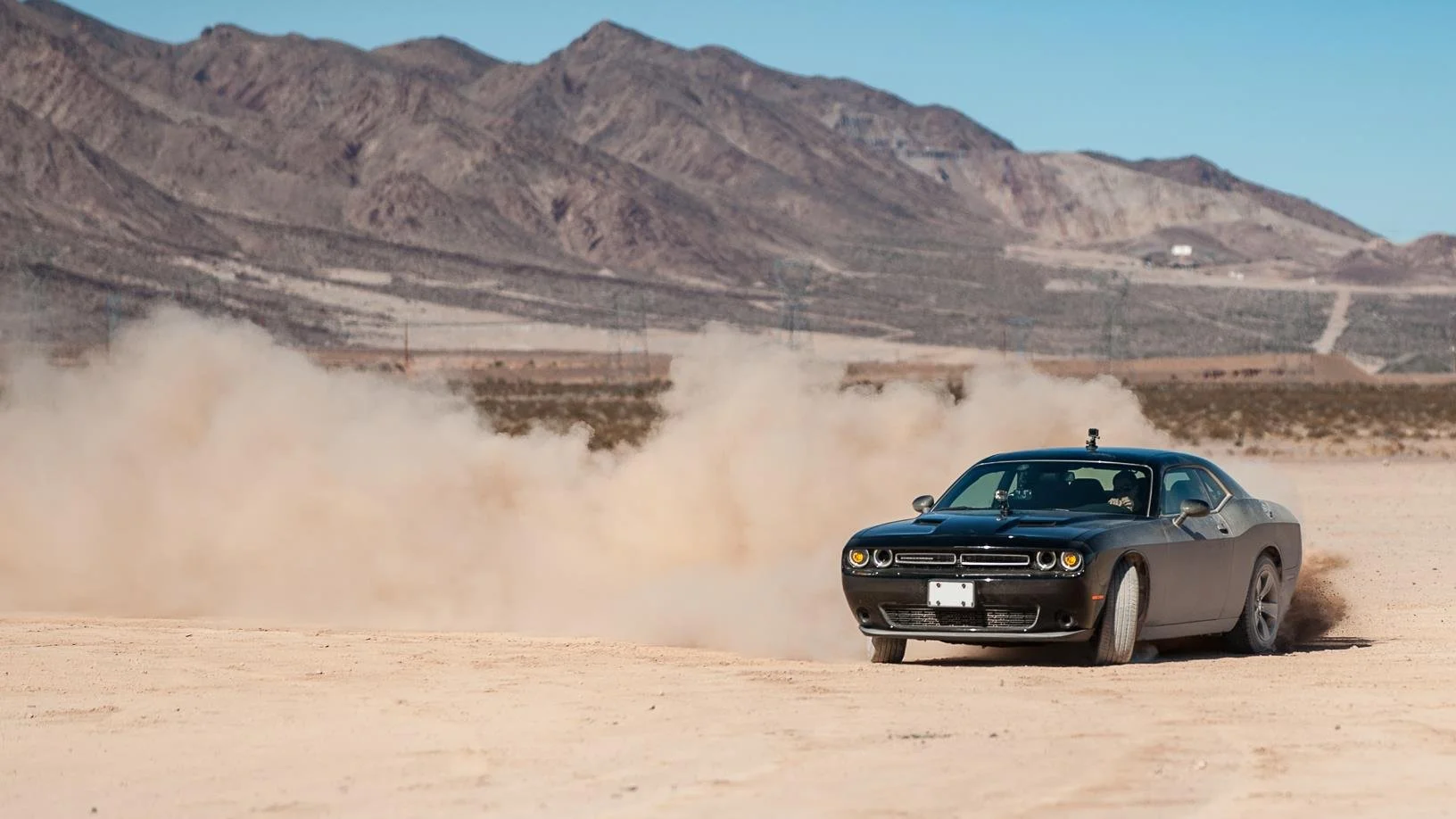  Evan enjoying a Dodge Challenger for time trials on dirt. 