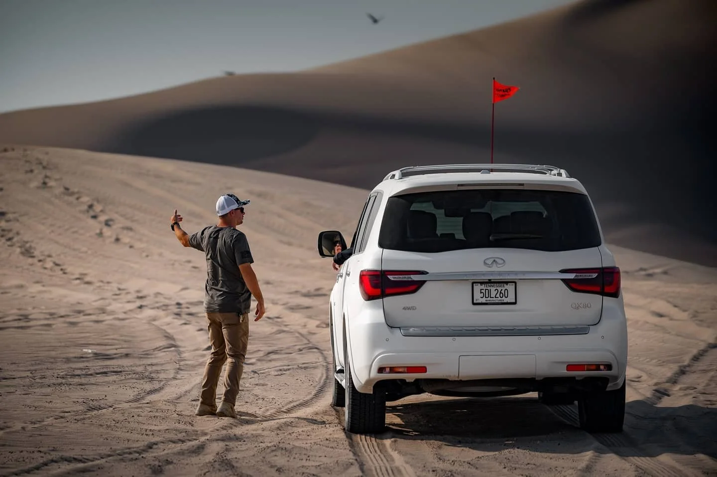  Evan coaching an Infiniti factory team in driving sand dunes for the Rebelle Rally. 