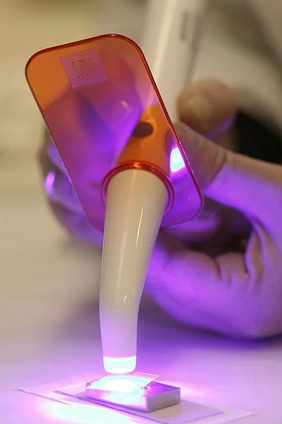 Brace brackets are fitted on using a dental adhesive cement that reacts to ultra-violet light.&nbsp;