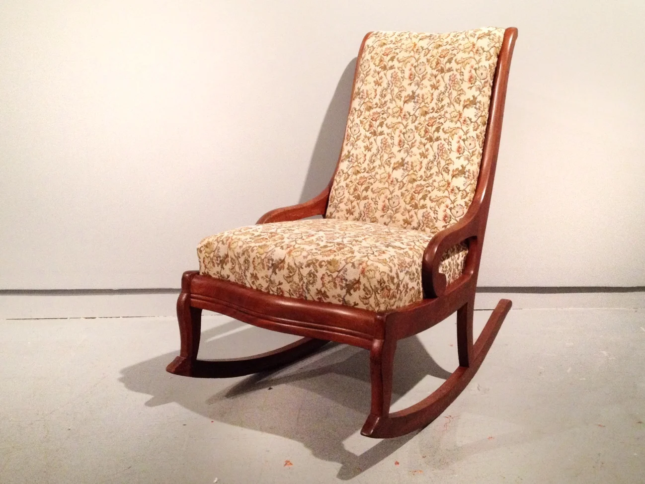 antique armless rocking chair.