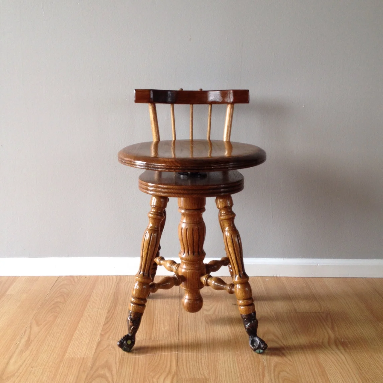 vintage clawfoot piano stool.