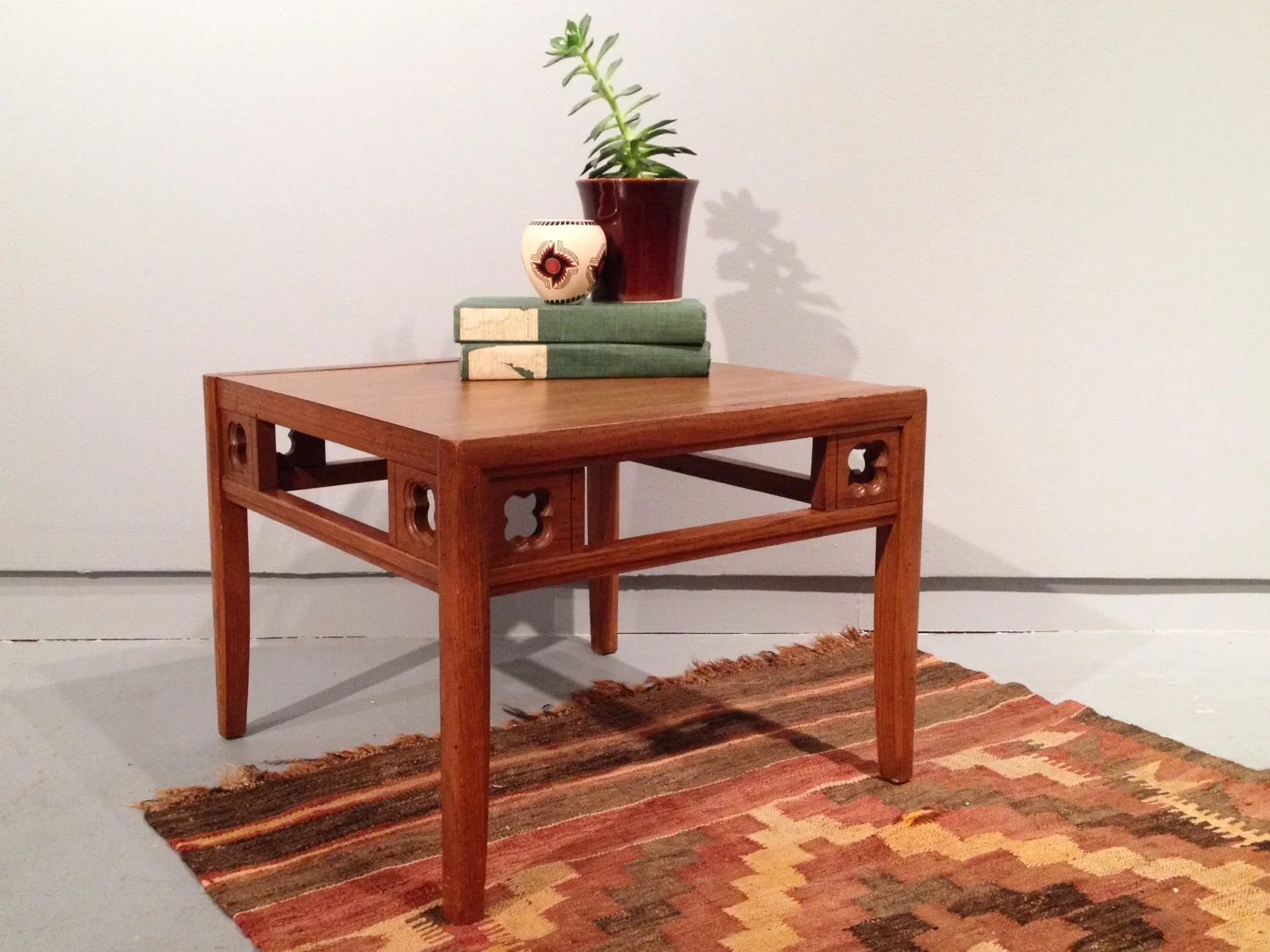 vintage table with clover cutouts.
