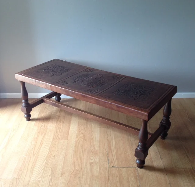 vintage 1960s tooled leather top coffee table.