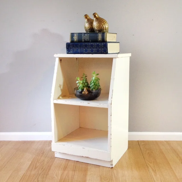 chippy white vintage side table.