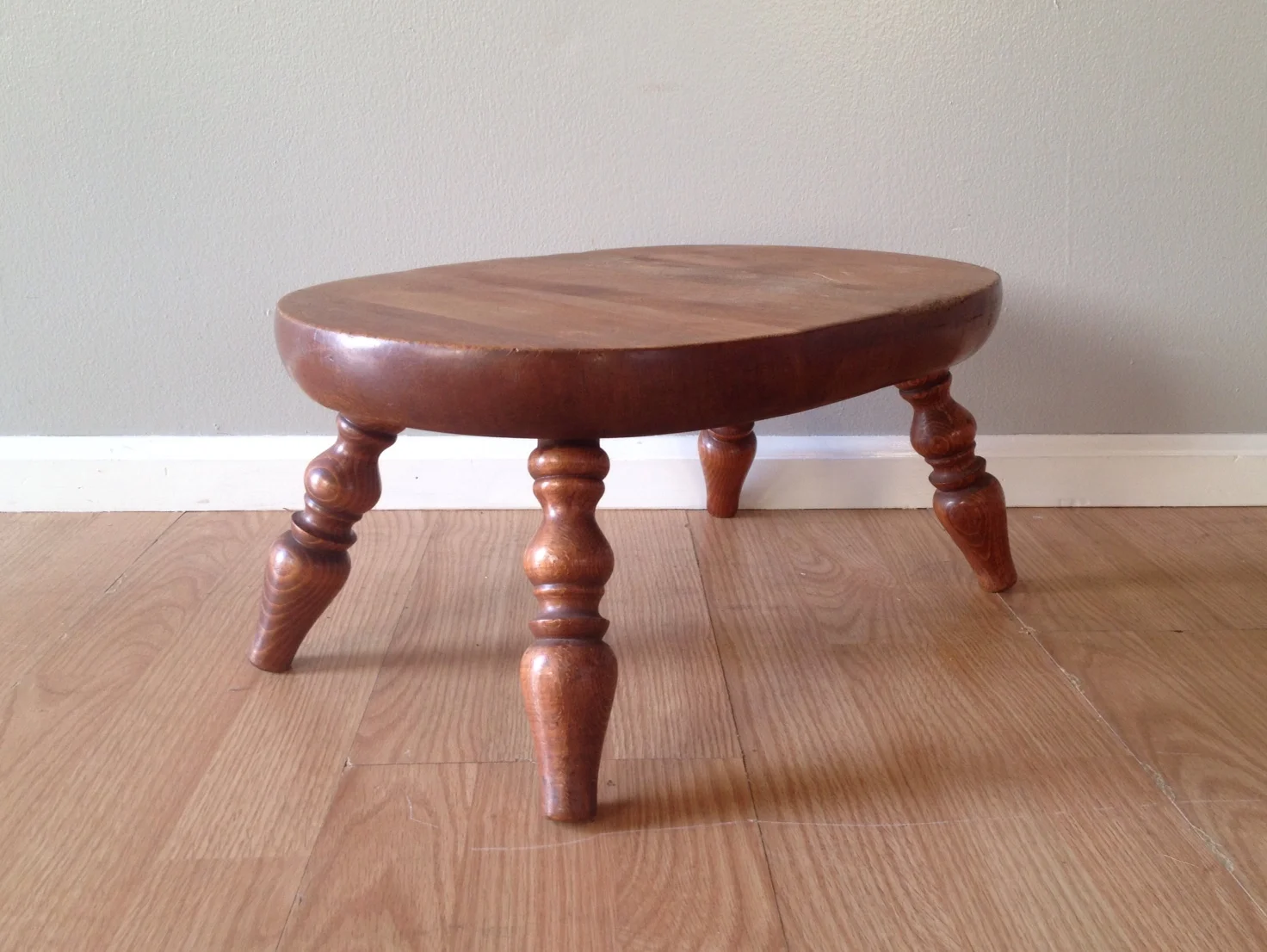 vintage oval wood stool.