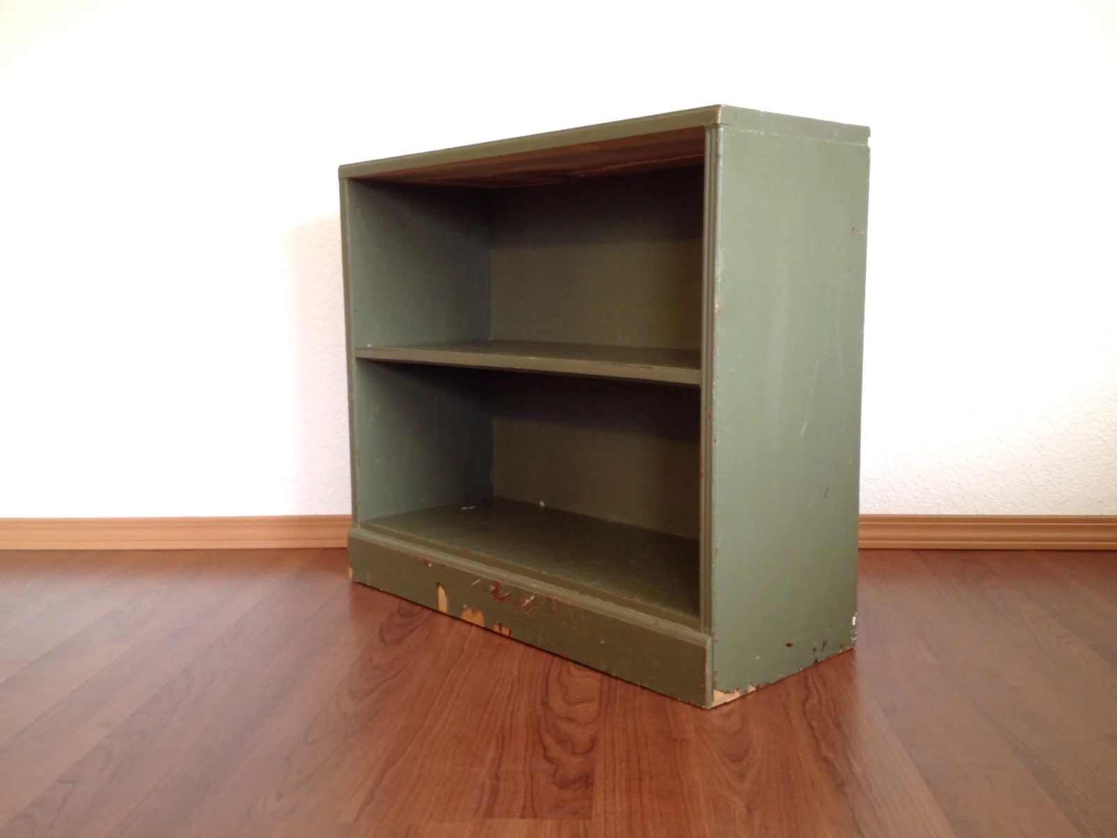 vintage distressed green bookcase.
