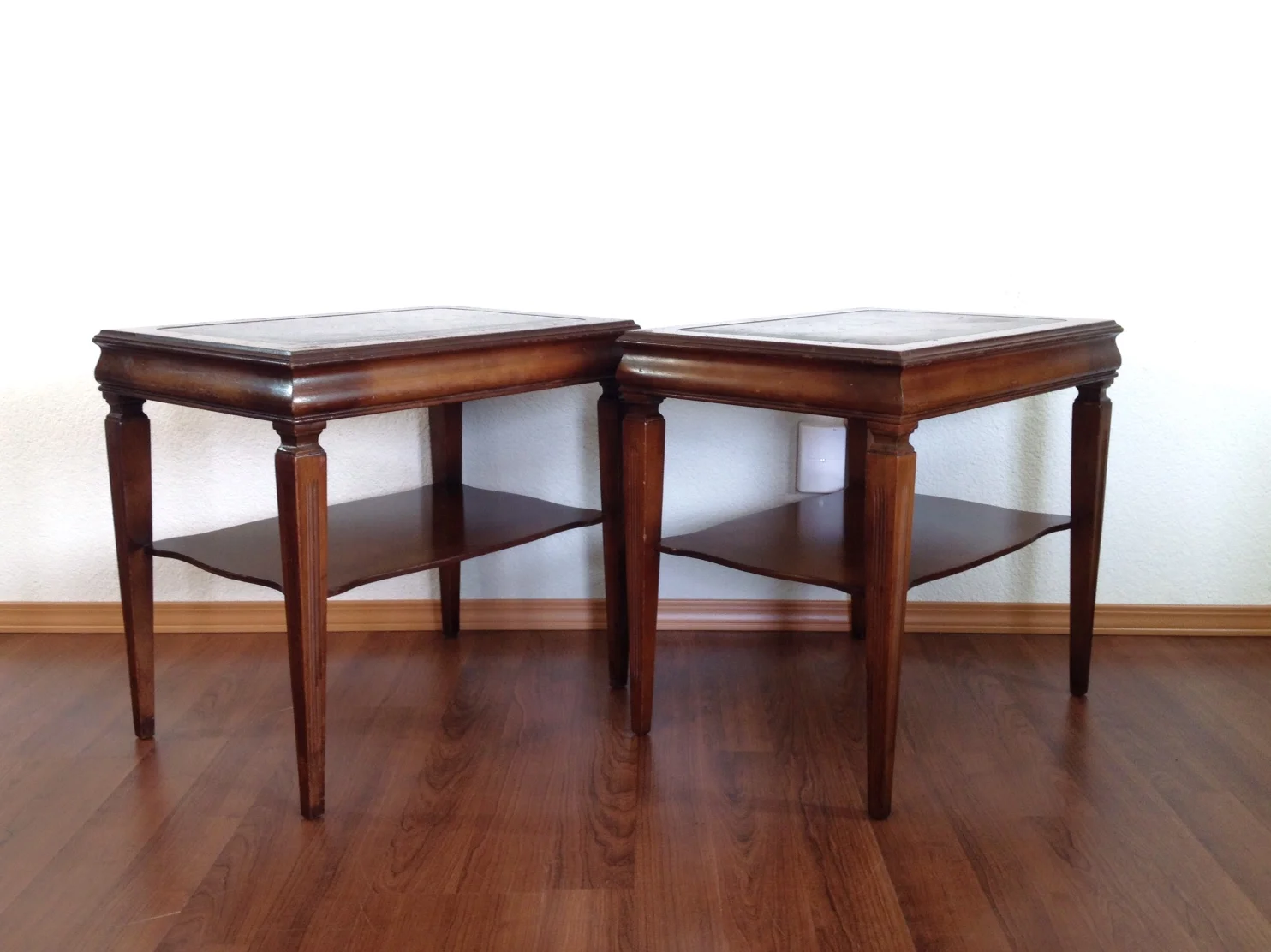 pair of neo empire side tables.