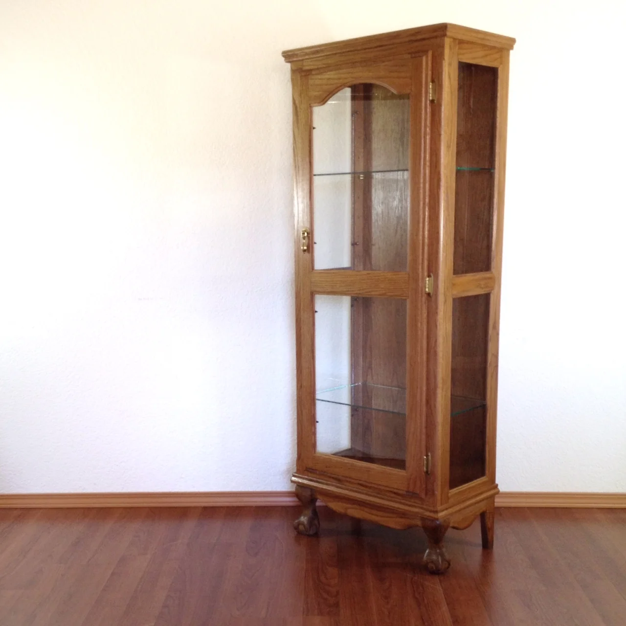 vintage clawfoot curio cabinet.