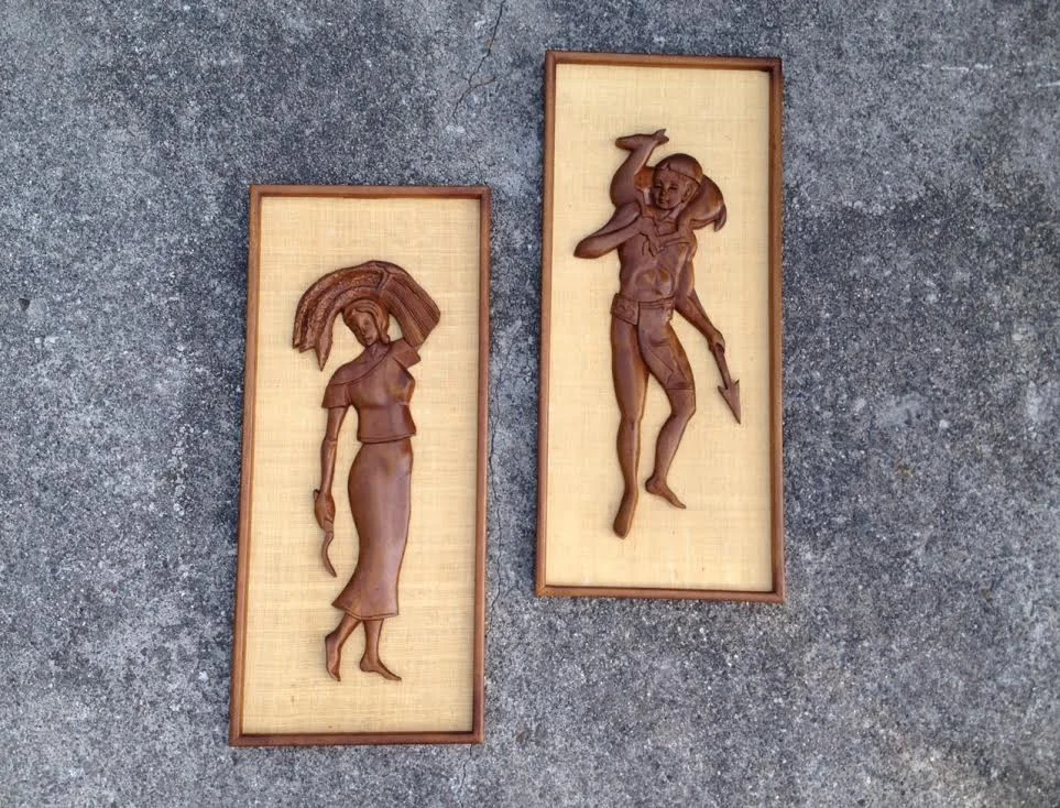 Pair of vintage wood + burlap wall hangings.