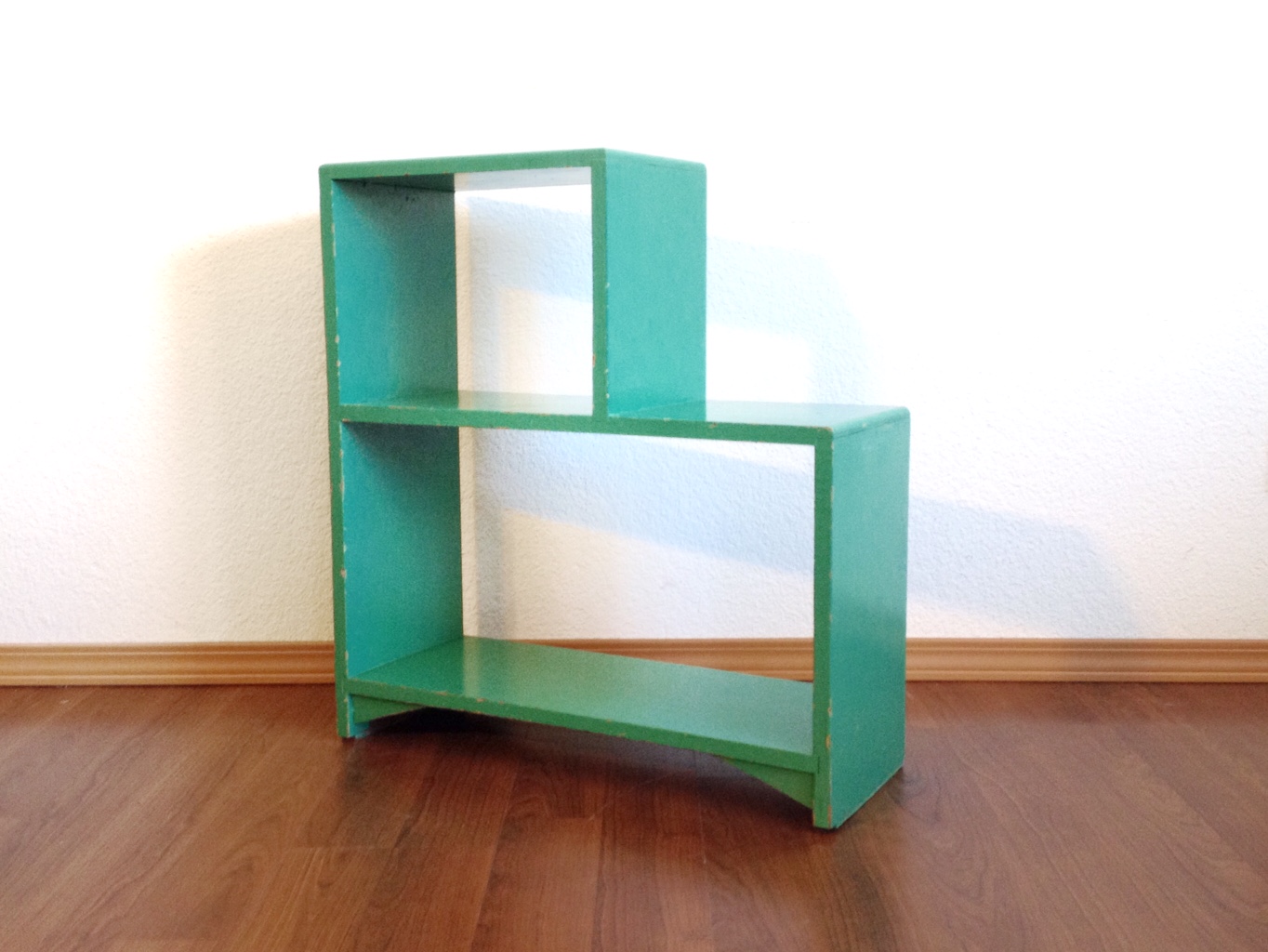 vintage stacked cube bookcase in jade green.