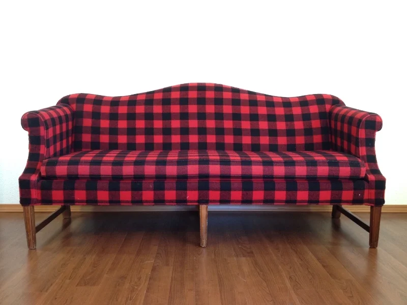 FOR RENT vintage lumberjack sofa.