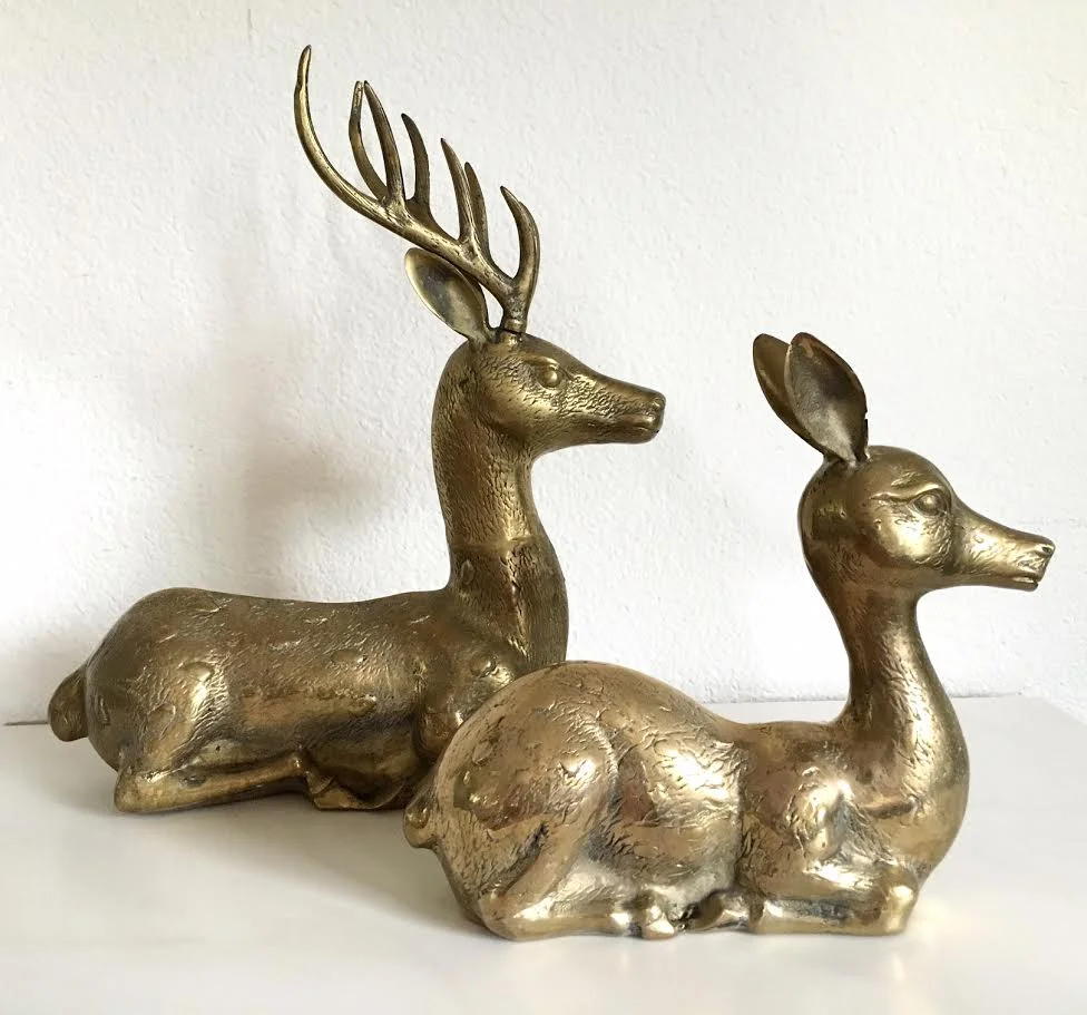 pair of large vintage brass deer.