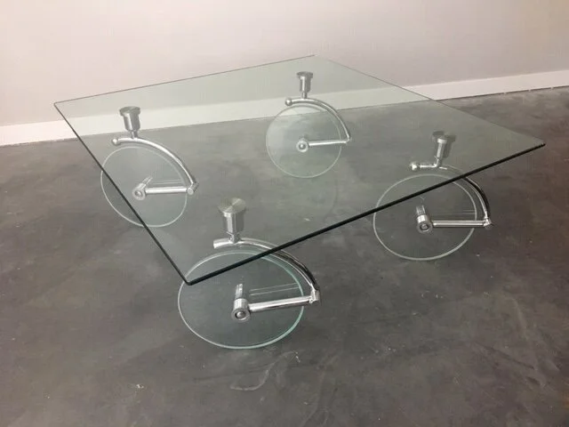 vintage 1980s postmodern 4 wheeled glass coffee table by Fontana Arte