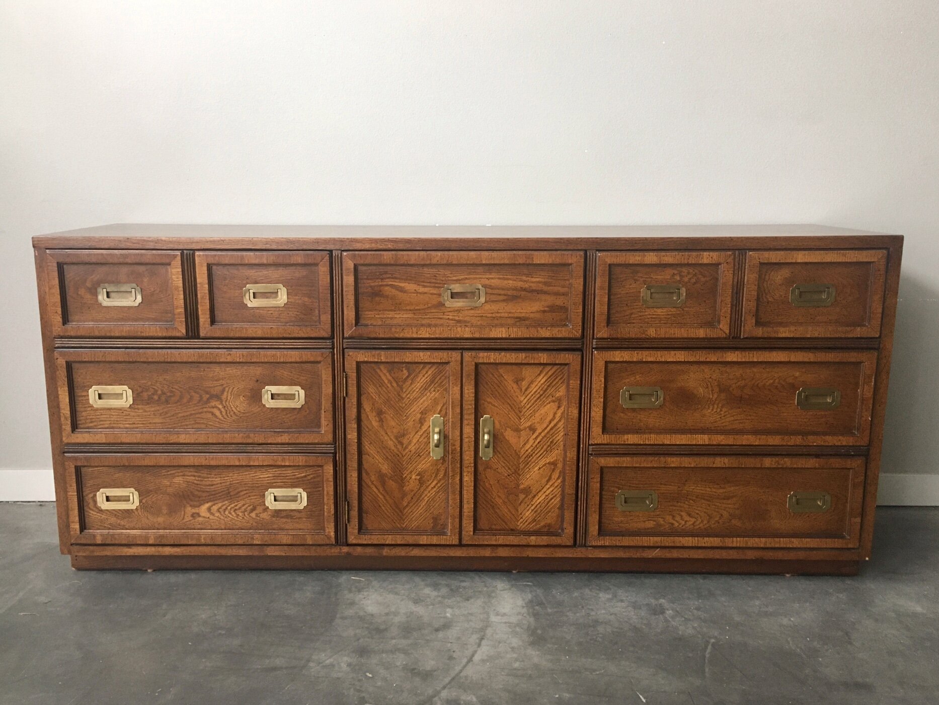 vintage mid century campaign style lowboy dresser.