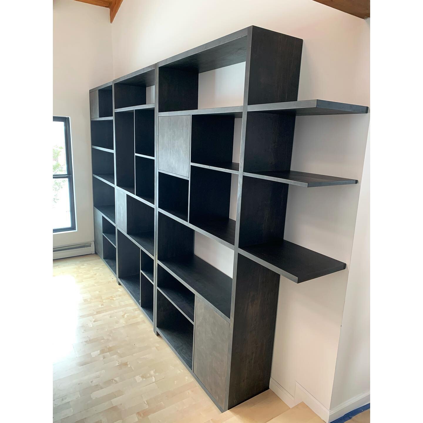 Custom shelving unit (12ft x 8ft) installed in its new home in Santa Fe. Made of ambrosia maple with an oxidized + charcoal finish.  Beautiful Ambrosia Maple from @alpinebuilderssupplyco 
.
.
.
.

#tetradesignworks #woodworking #modern #bookshelves  