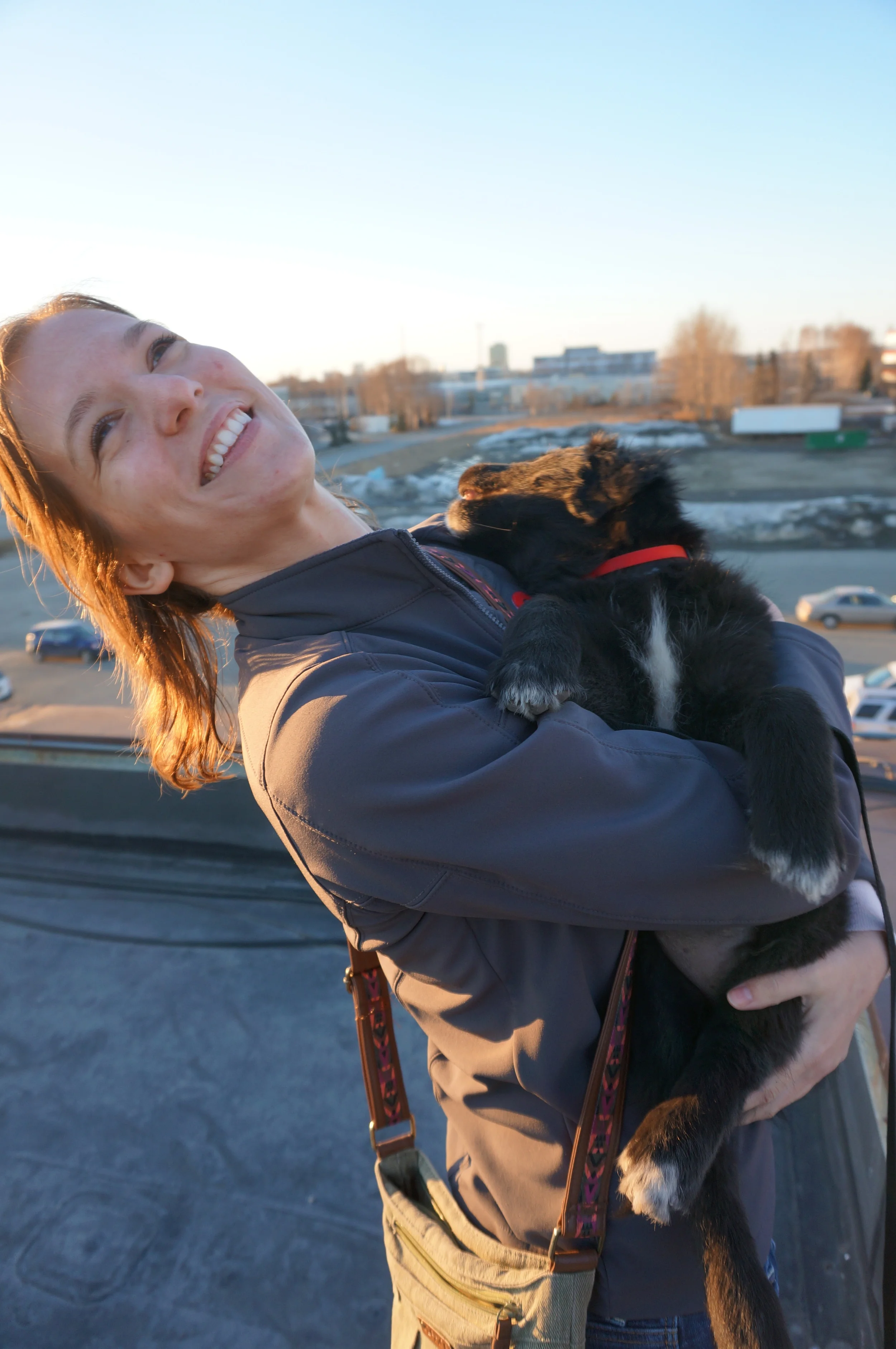 The look on Reba's face in this photo-- even while her puppy, Kobuk, tries to bite her is pure joy. I love this shot.