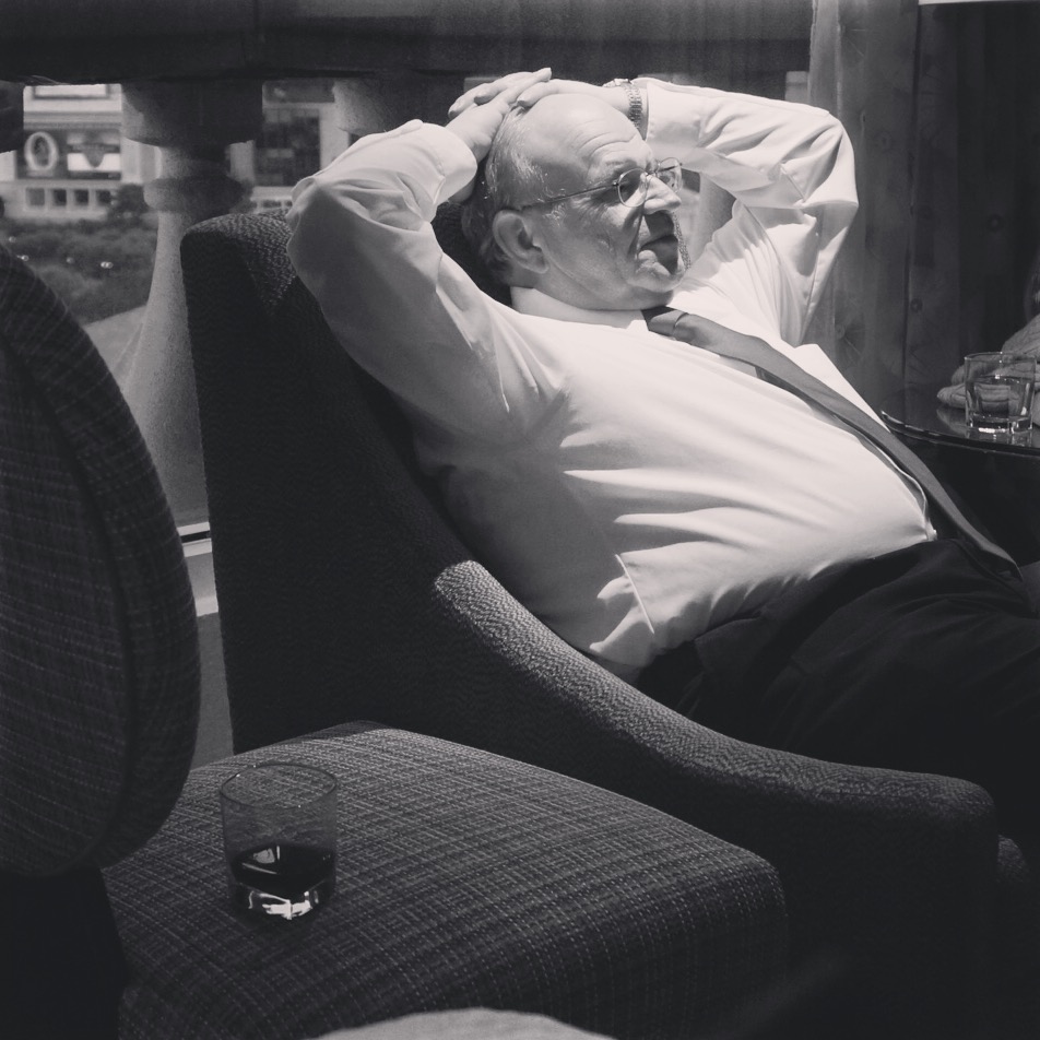 I feel like my dad looks like a President or Winston Churchill in this photo. I loved the lighting and his drink on the chair next to him.
