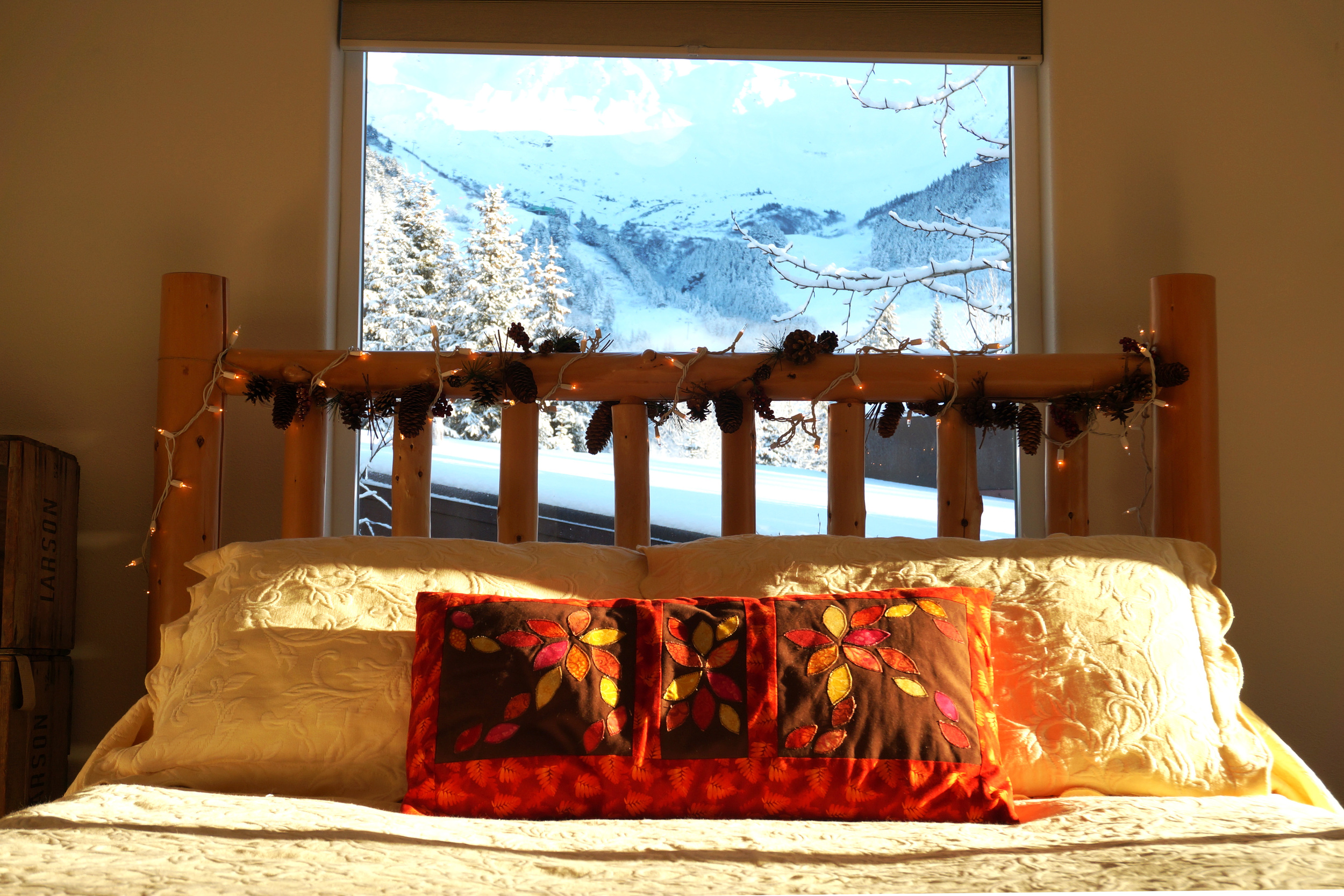 With a view like this and a bed washed in sunlight, how could you blame me?