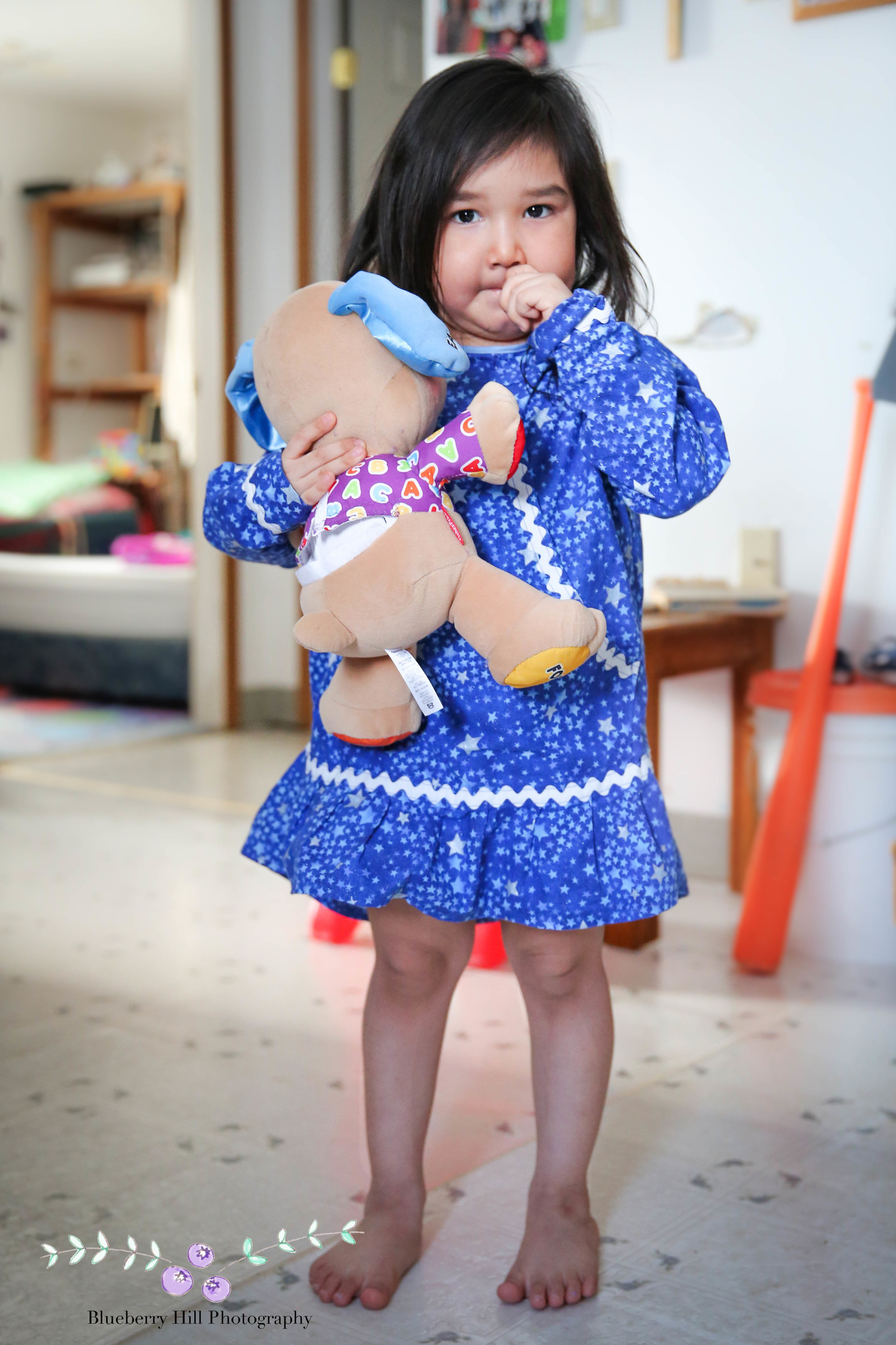 Lena's great-grandaughter shows off her Qaspeq.