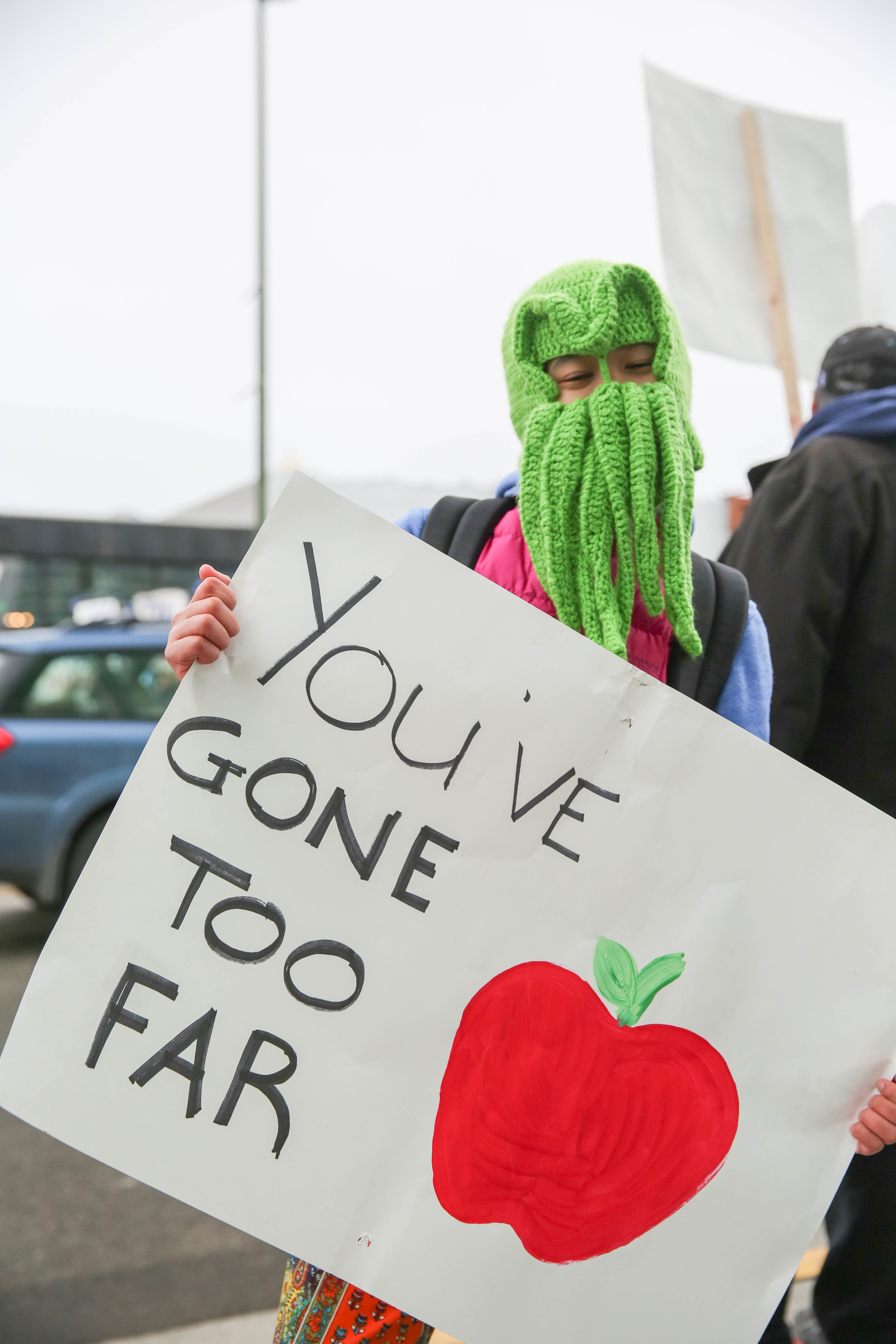 I love the contrast in this one... if the girl with the knitted octopus mask thinks you've gone too far, then you've gone too far!