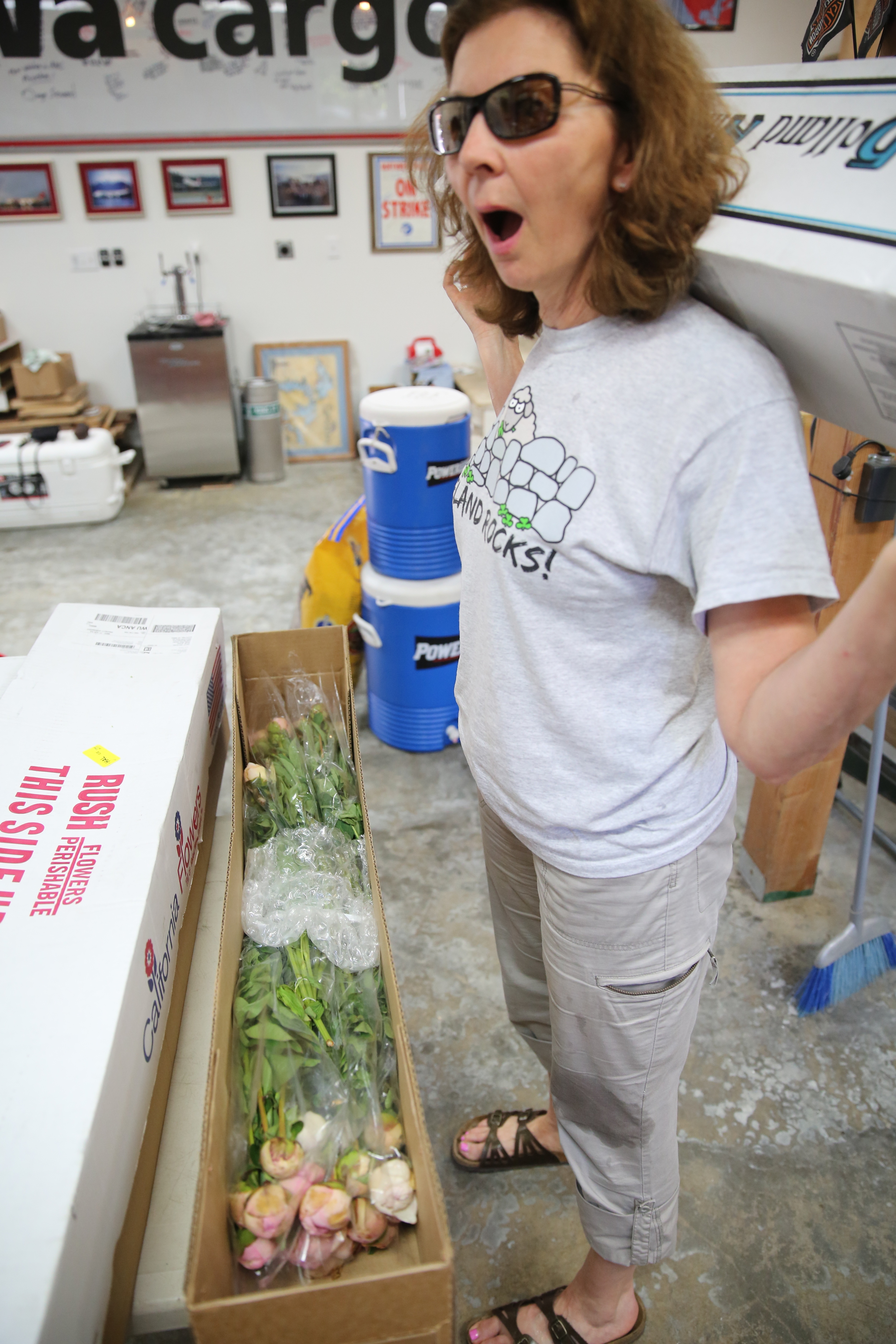 My Mom reacts to opening a box of gorgeous peonies from Fifty Flowers.
