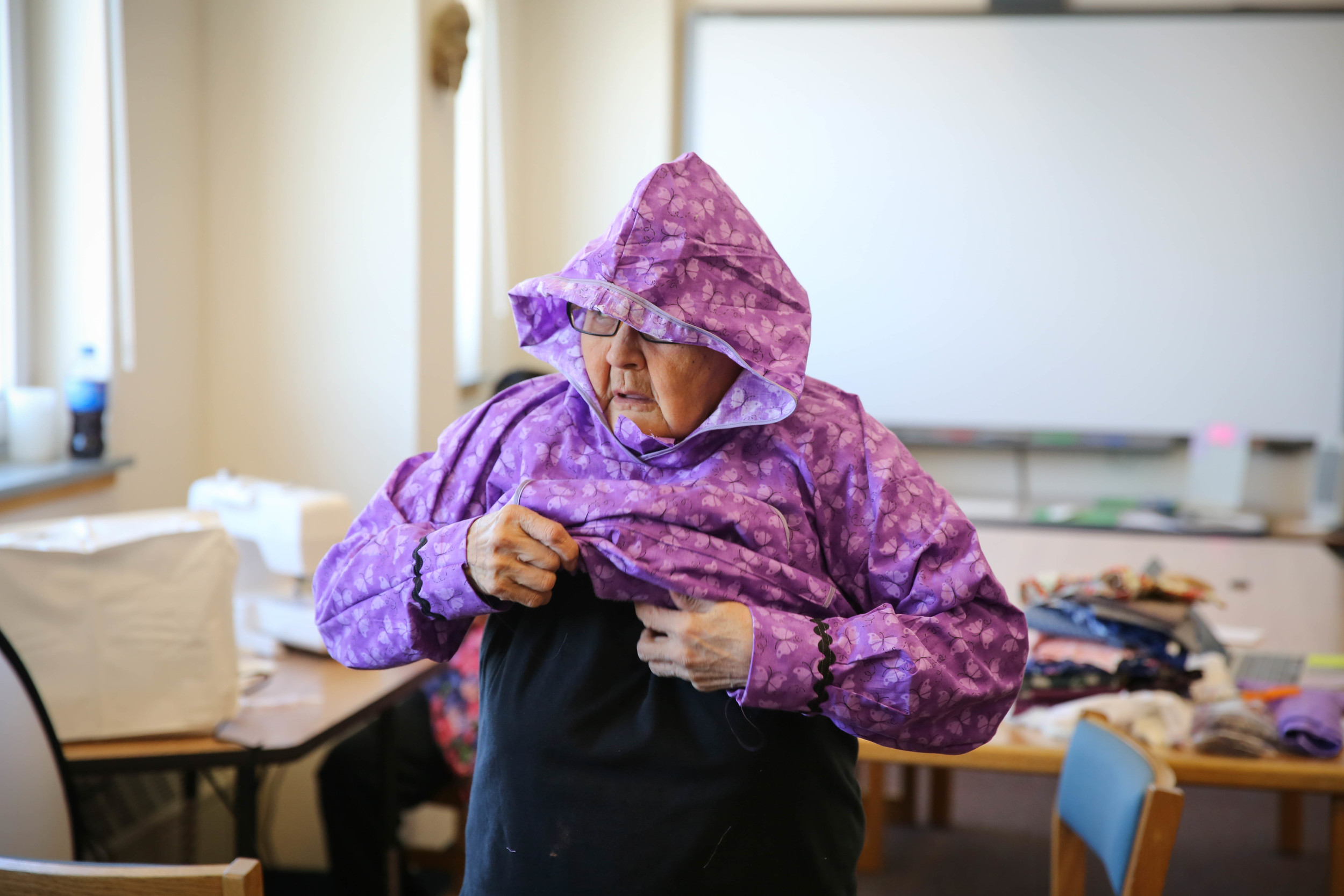 Lena tries on her new Kuspuk in Wales, Alaska.