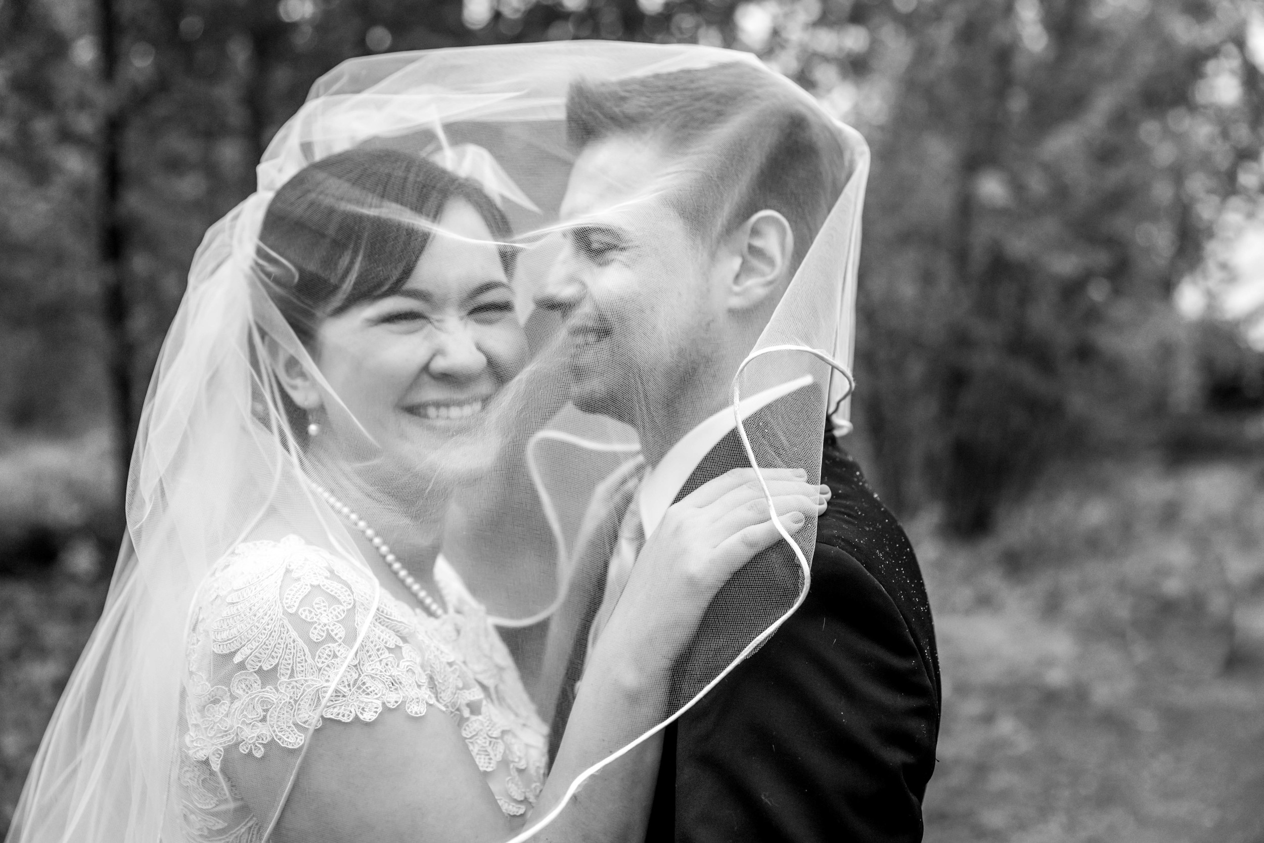 Mary was telling me that Jazon always seems to attract more mosquitoes than she does. We laughed about how this veil shot was really like a marital mosquito net. I didn't realize it really was such an inside joke until a bottle of bug spray even worked its way into one of the wedding toasts! Maybe the veil will need to become a part of outdoor Alaska adventures? ;)