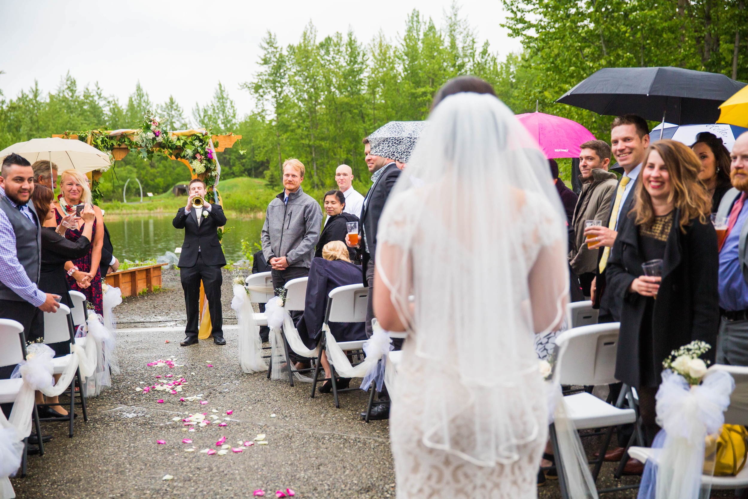 Jazon surprised the guests by playing "Here Comes the Bride" on his trumpet while Mary walked down the aisle.