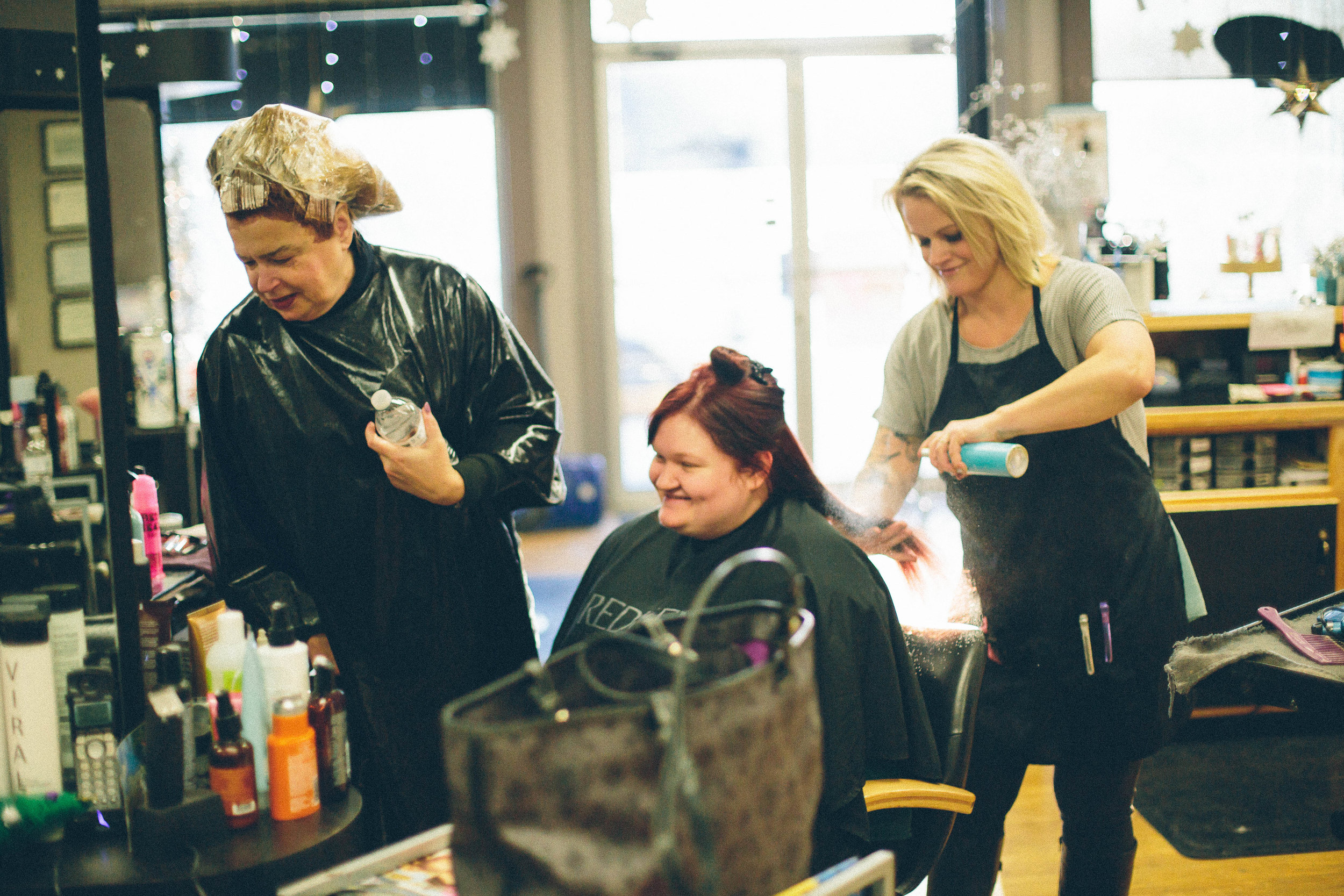 I love this photo because the woman on the left was getting her hair done and overheard it was Lorraine's wedding day. She came over to check out the "inspiration" picture and offer her congratulations. I love that weddings bring out such joy-- and not just from those involved!