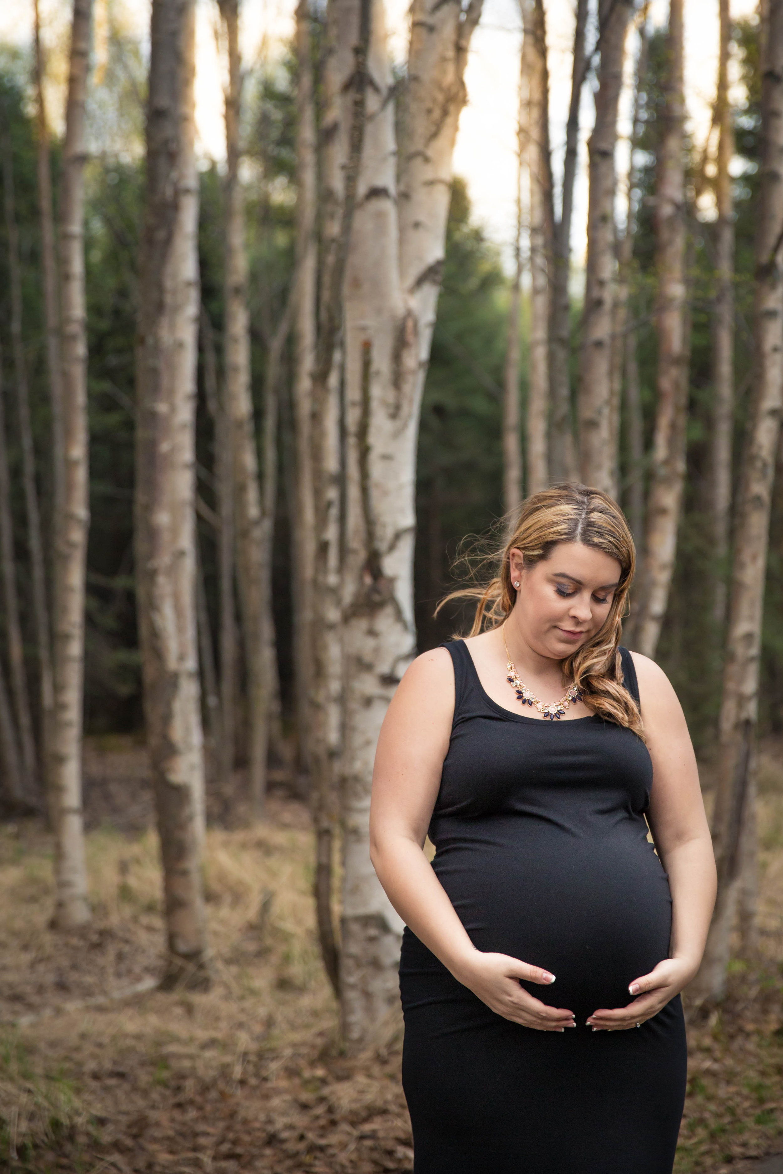 Danae's session was another one that I loved. It wasn't particularly pretty out-- thanks to being break-up in Alaska-- but we found these gorgeous woods and some brilliant light, and she just became this amazing goddess during her session.