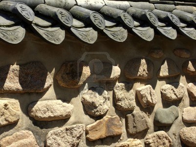 6257618-stone-wall-with-tiled-roof-korean-traditional-wall.jpg