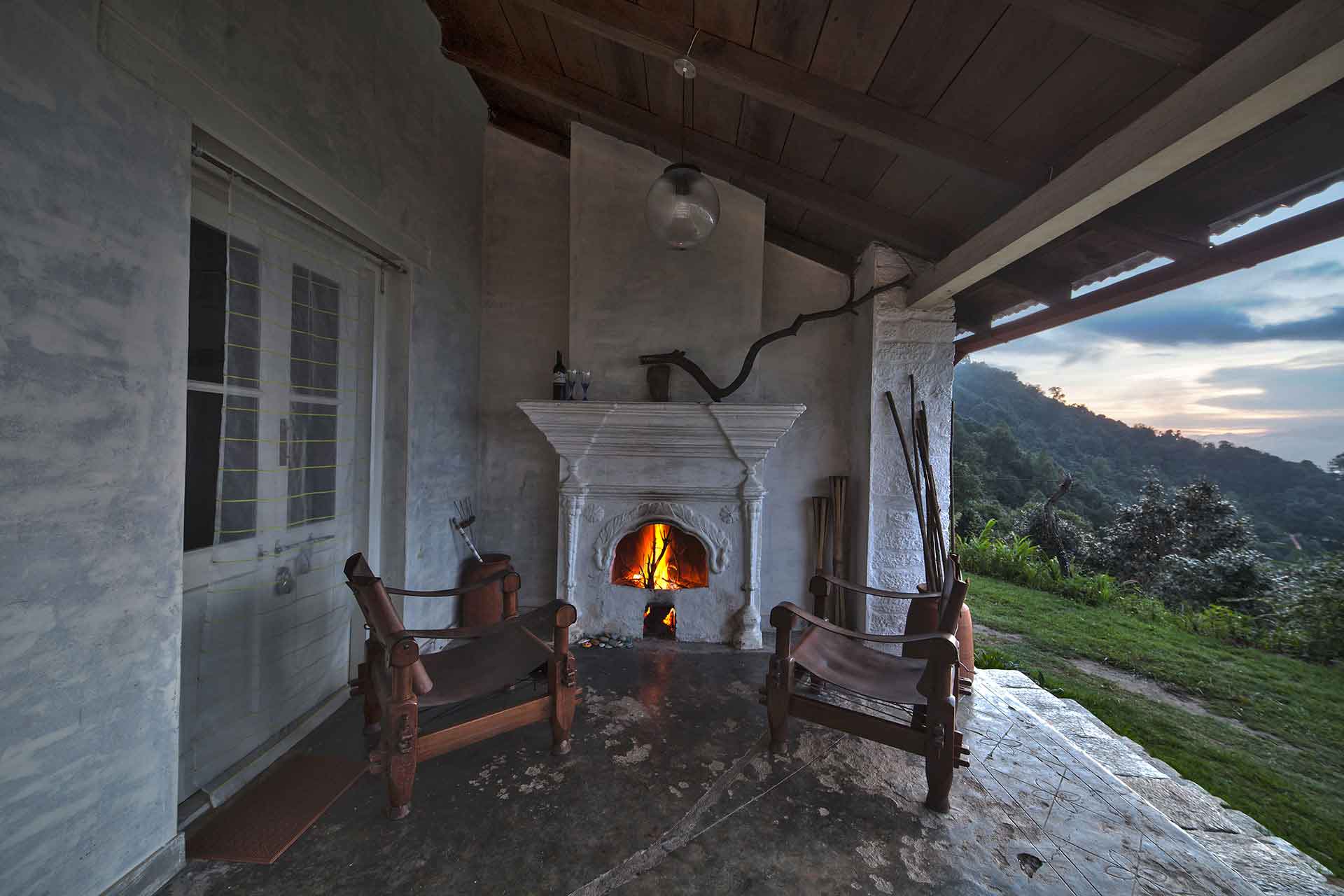  Spread across the length of the house with fire places on each side 