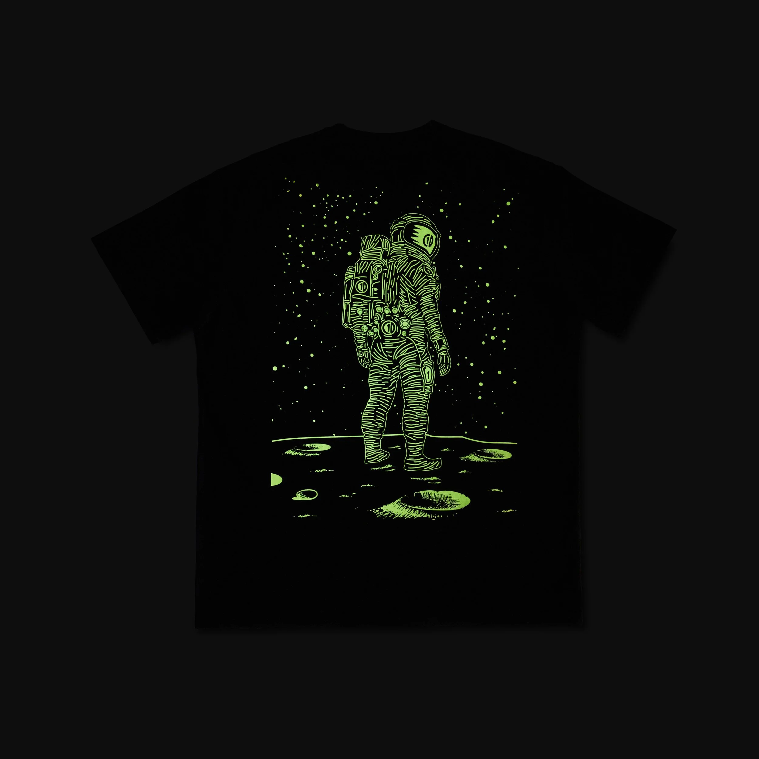 Circle 1 black tee with a glow-in-the-dark astronaut graphic - apparel product photography
