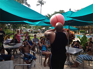 Stephen Mackey blowing up a hot water bottle for the American Idol - Puerto Rico contestants