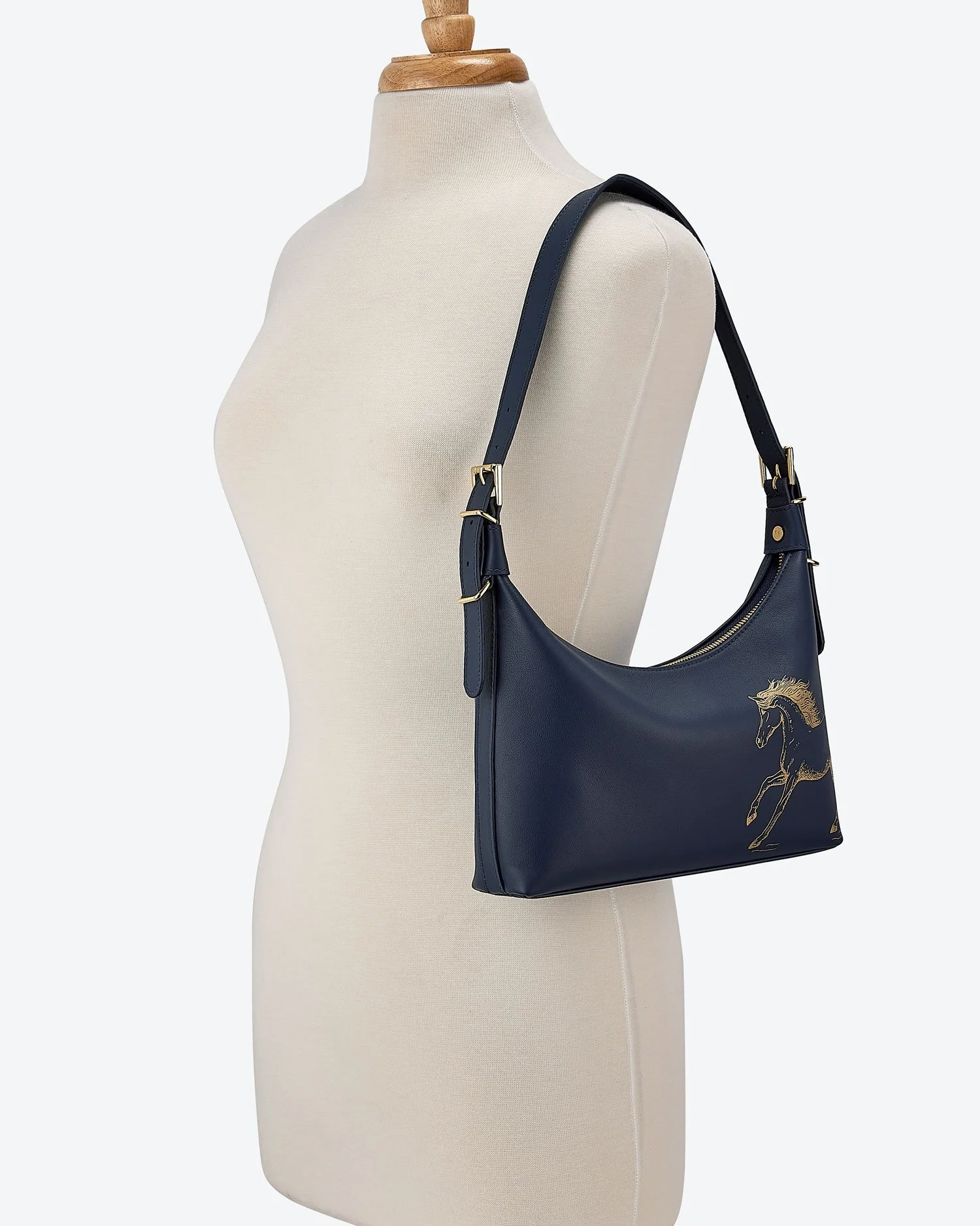 Blake_elegantHorse_leatherShoulderBag_navyBlueandGoldtrim_onshoulderW.jpg