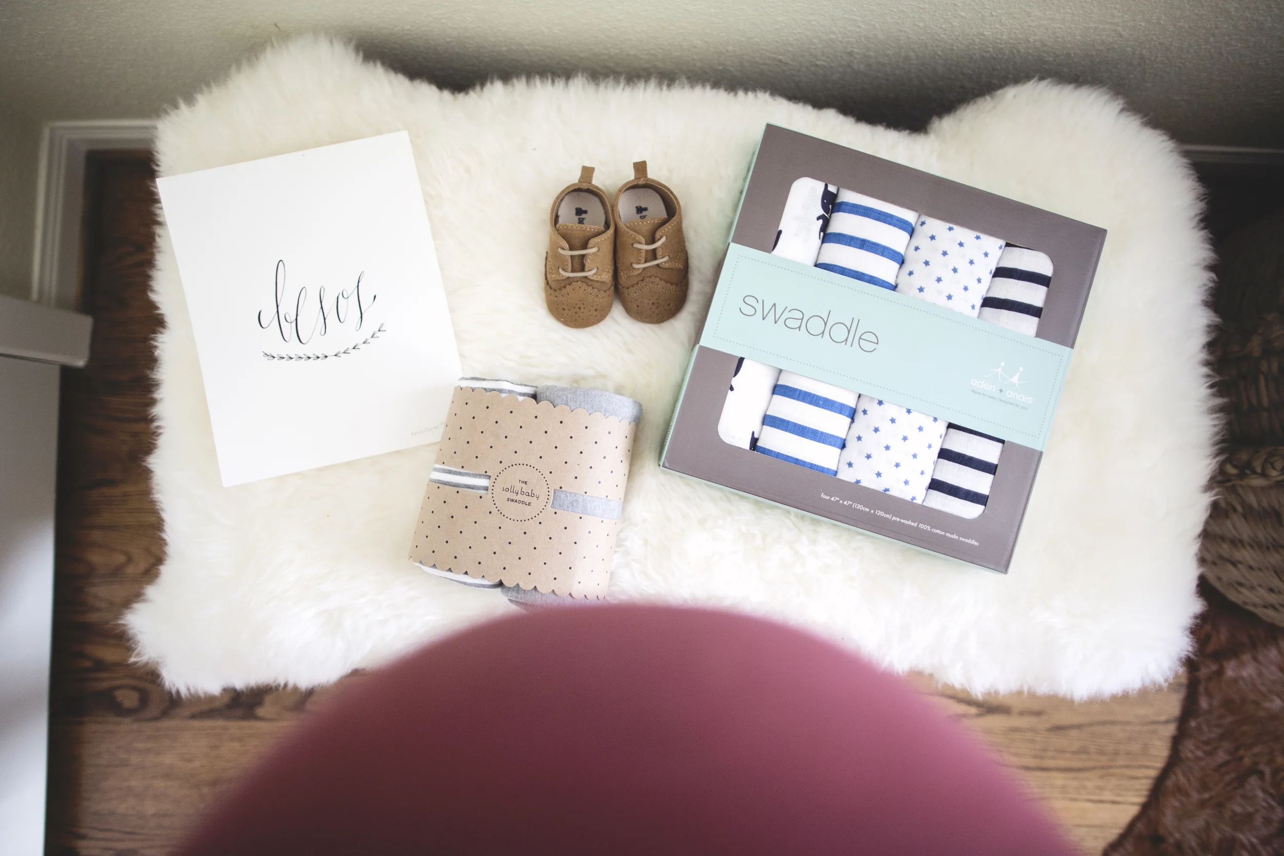 DAY 55- Swaddles, shoes, onesies, everything is adorable.