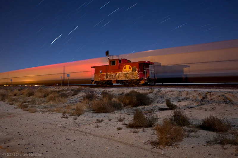 Santa Fe Caboose on the Night Plain I - by Joe Reifer