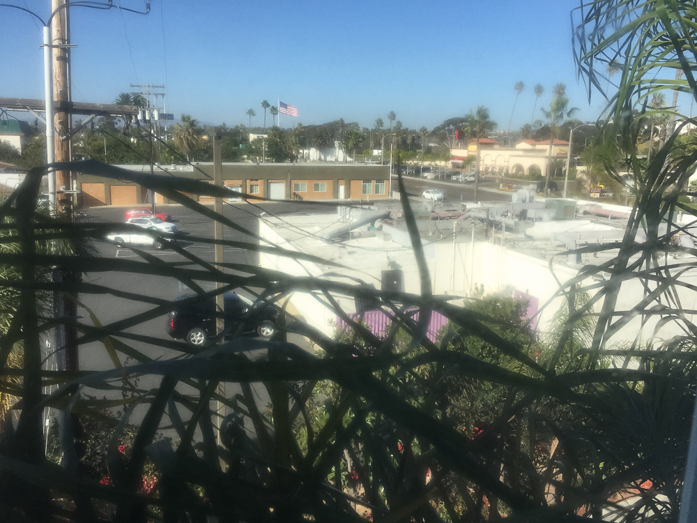 Later, in Oceanside, my hotel looked out over a gentlemen's club parking lot.