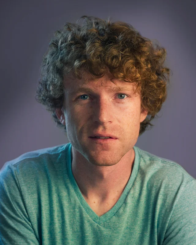 2018_09_conorHeadshot_longHair_640x800.jpg